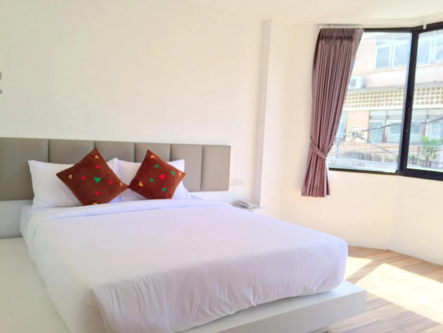 Bed in The Harbour Front Hotel