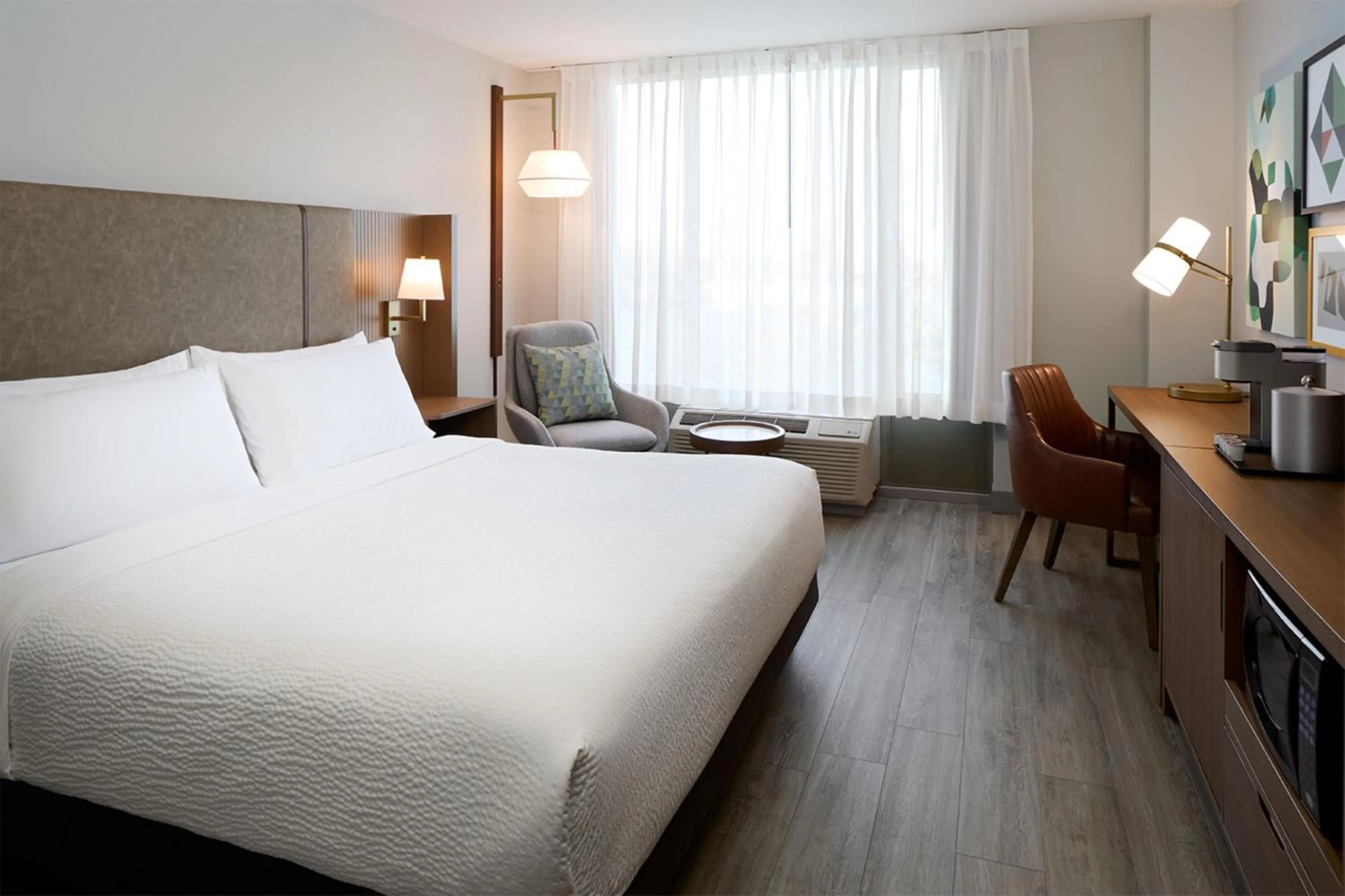 Photo of the whole room, Bed in Holiday Inn & Suites Montreal Airport by IHG