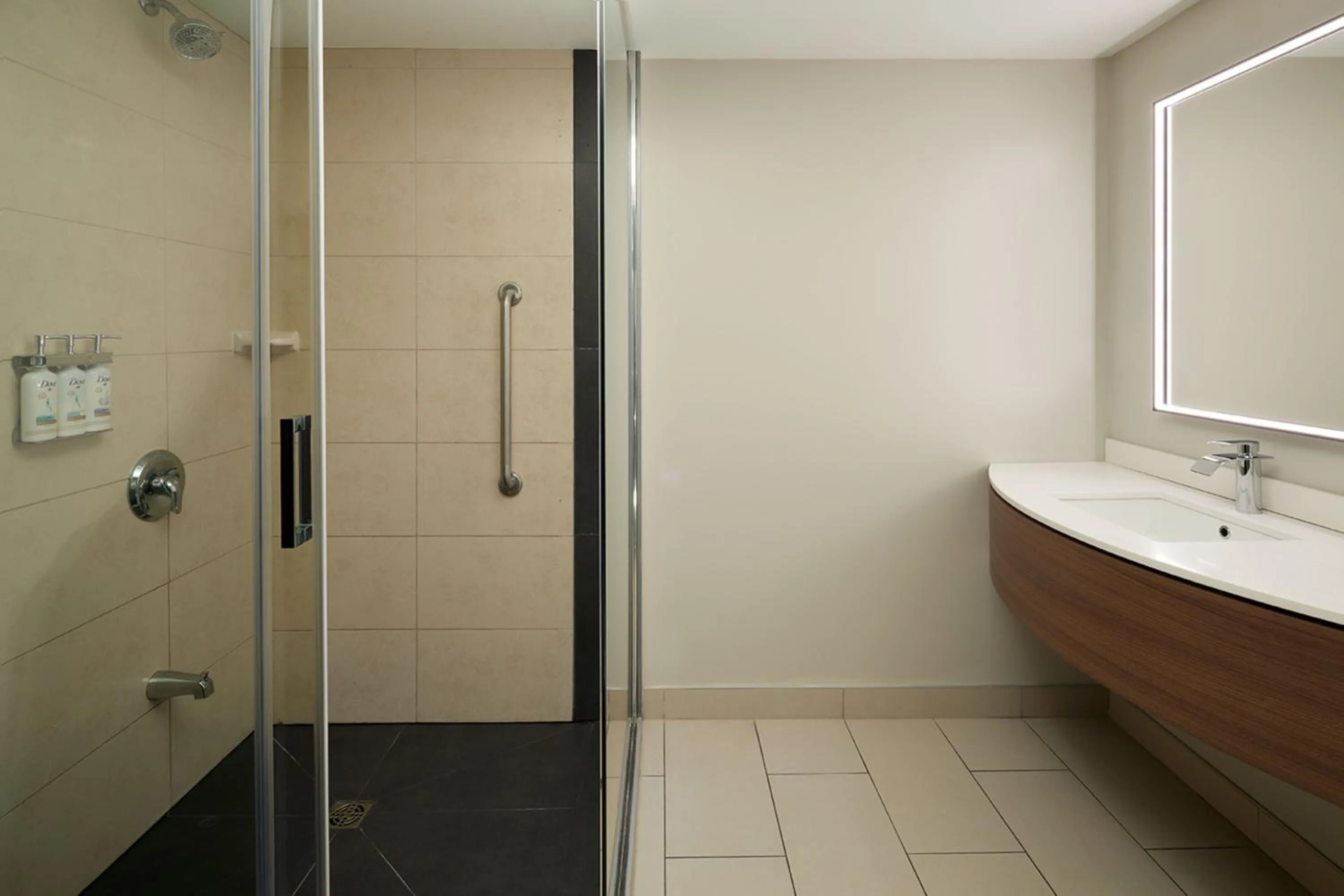 Bathroom in Holiday Inn & Suites Montreal Airport by IHG