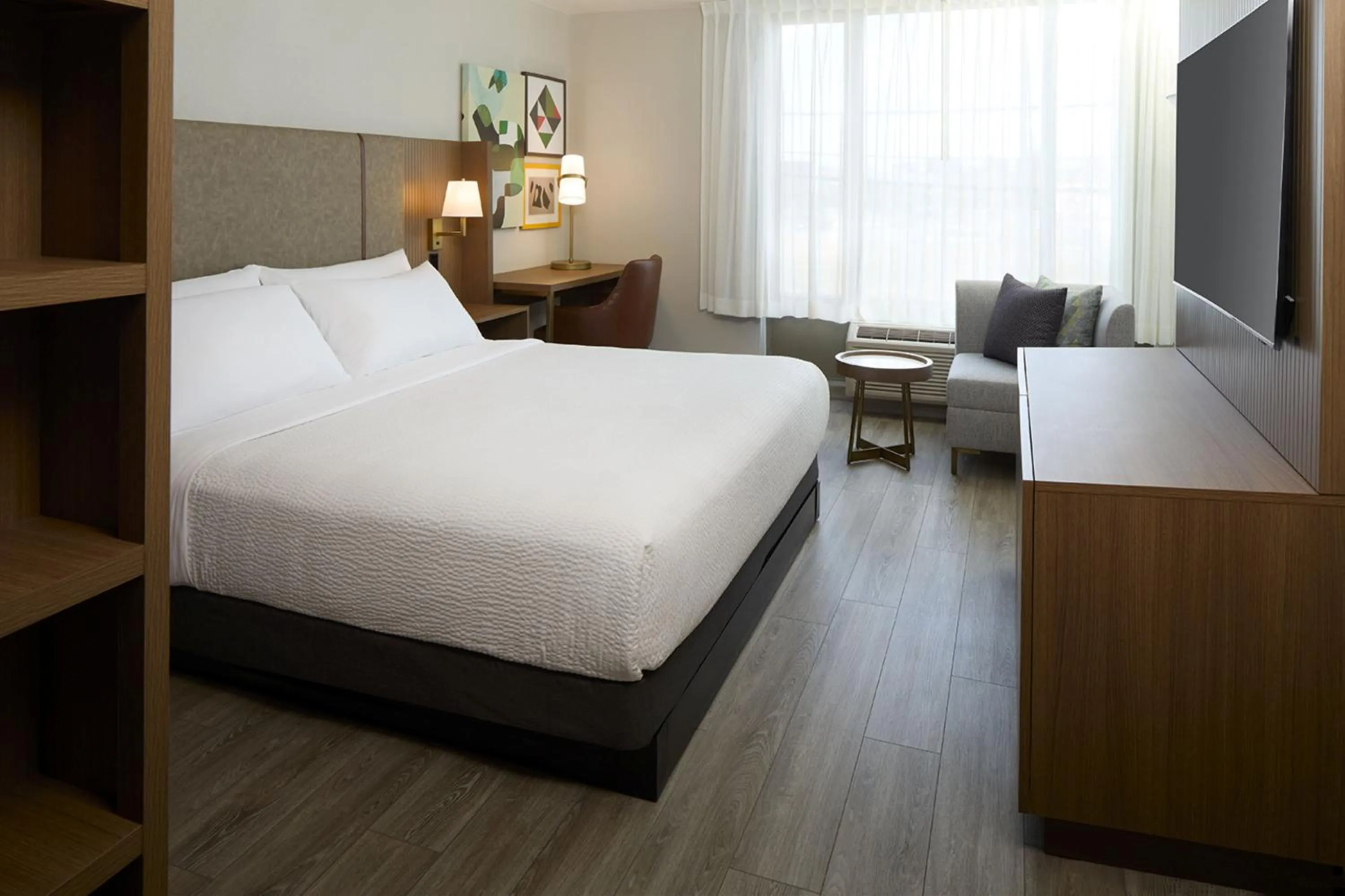 Photo of the whole room, Bed in Holiday Inn & Suites Montreal Airport by IHG