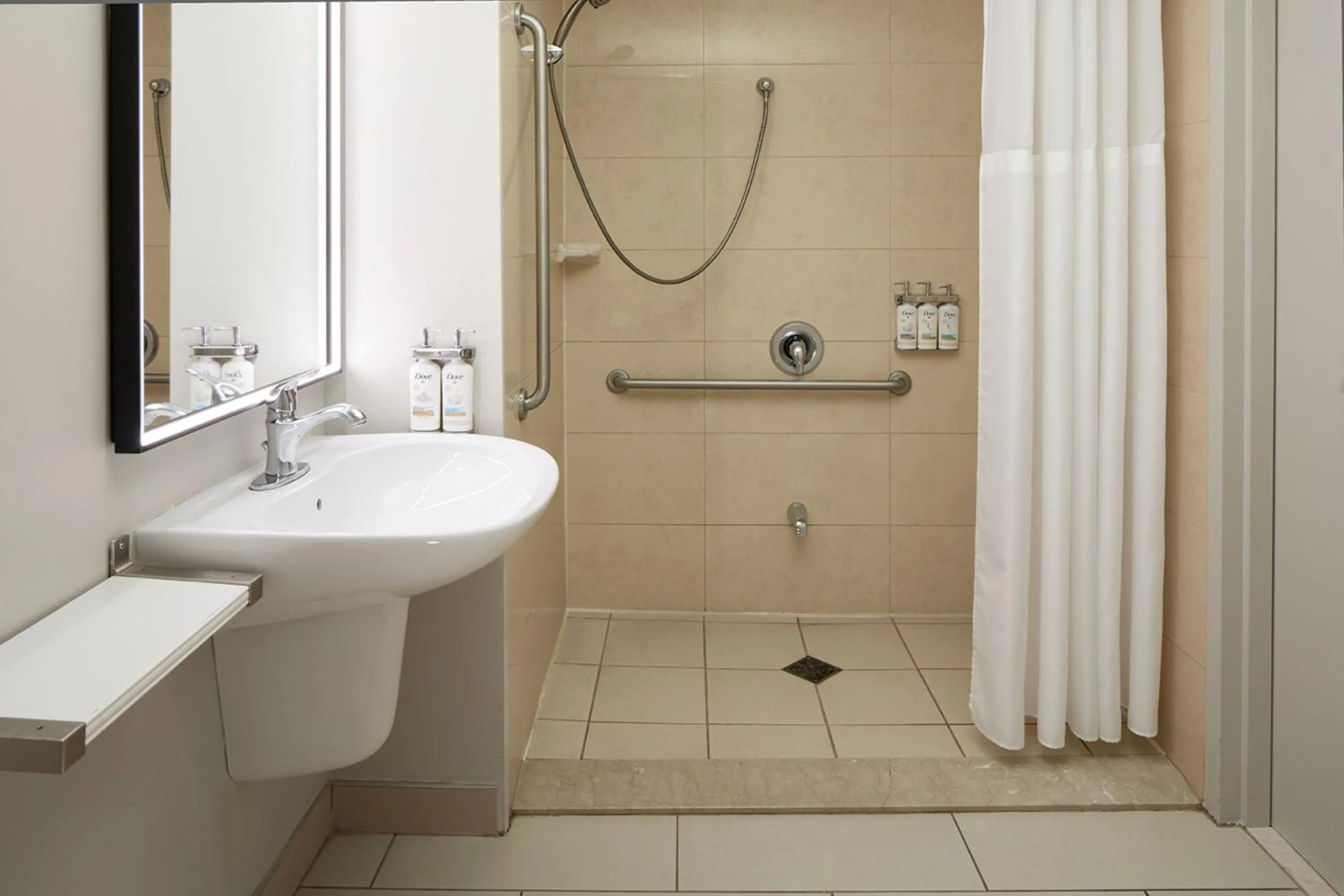 Bathroom in Holiday Inn & Suites Montreal Airport by IHG