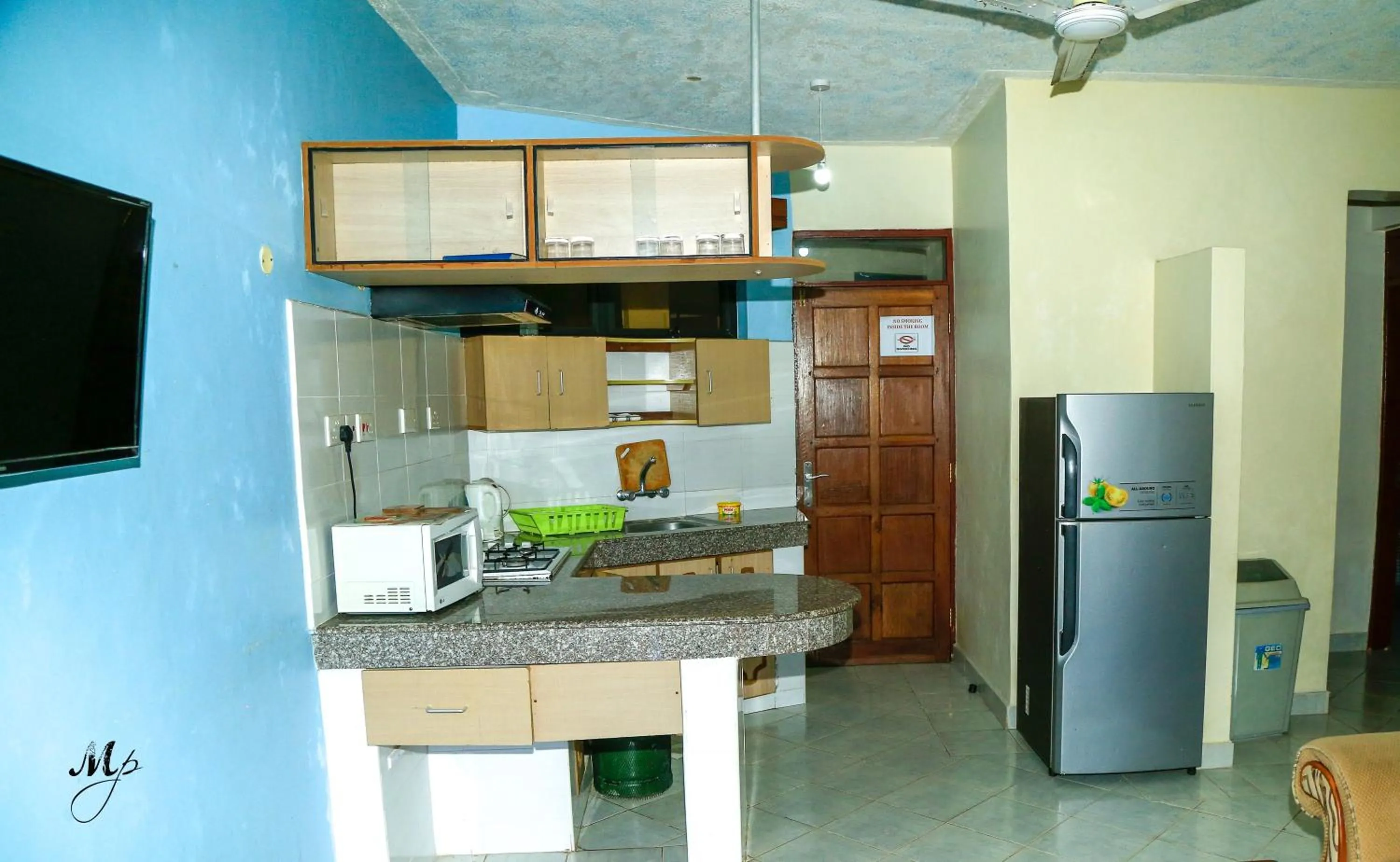 Kitchen or kitchenette in Mei Place Apartments