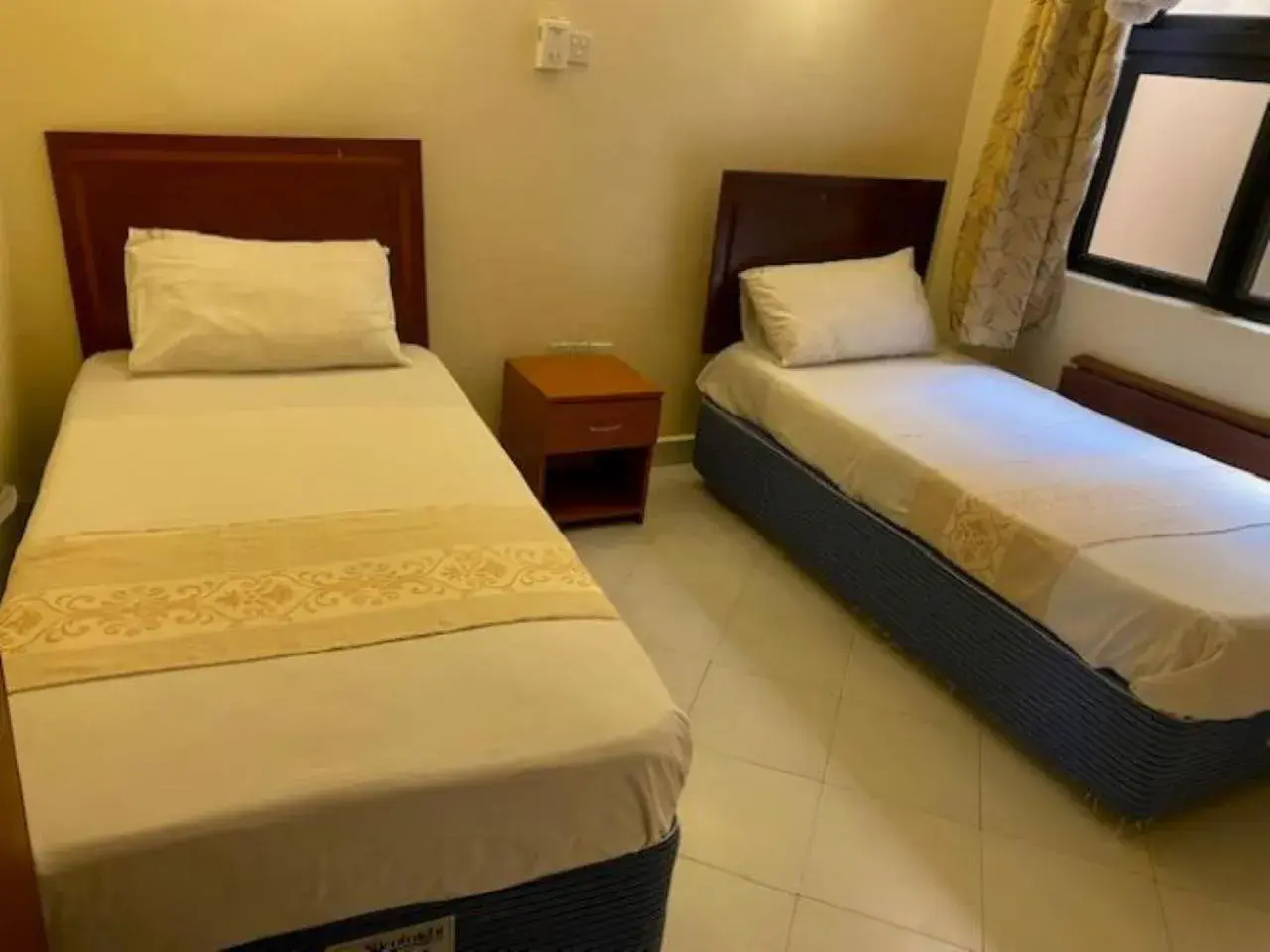 Standard Twin Room - single occupancy in Mei Place Apartments Standard Twin Room - single occupancy in Mei Place Apartments