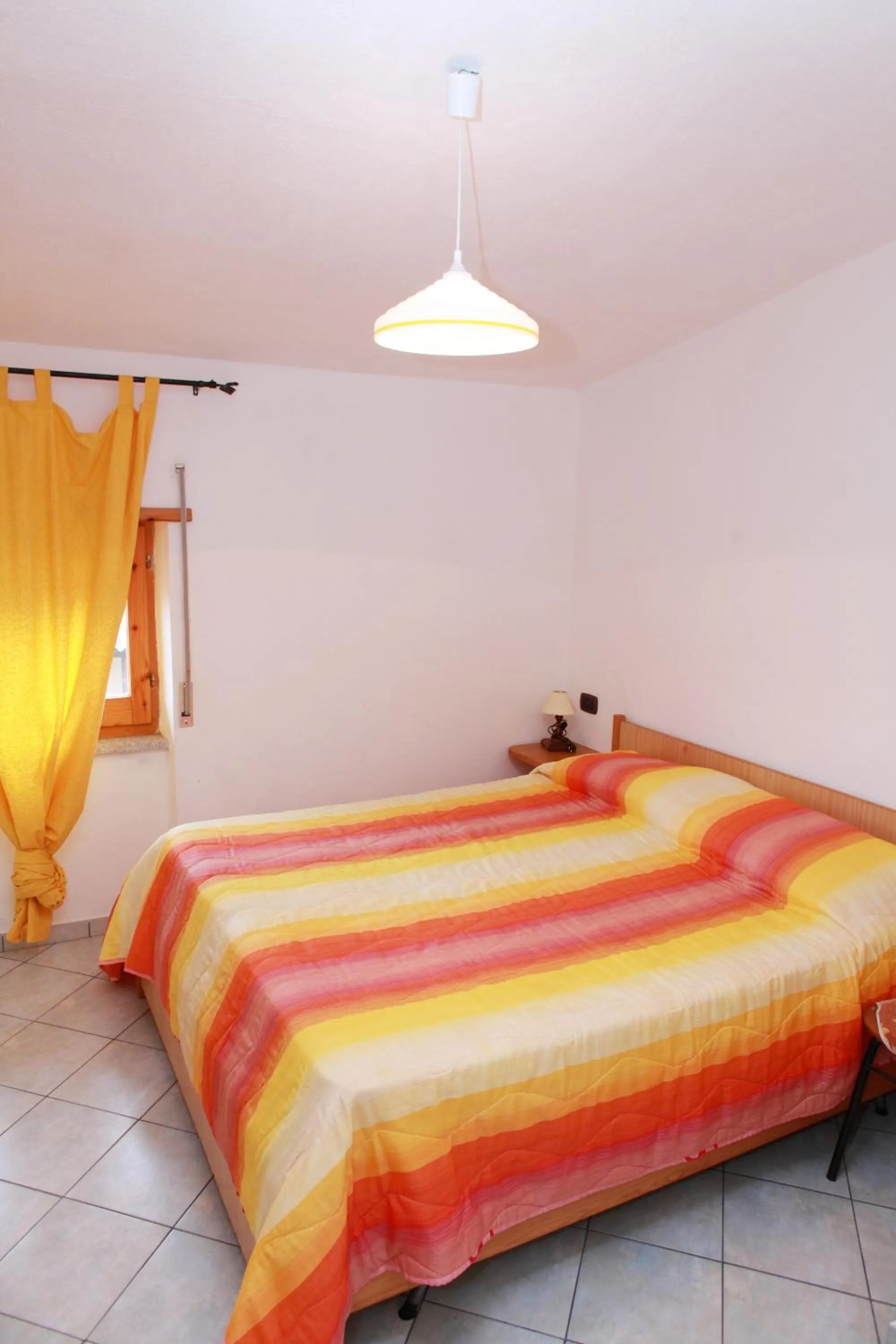Bedroom, Bed in Appartamenti Mare Blu
