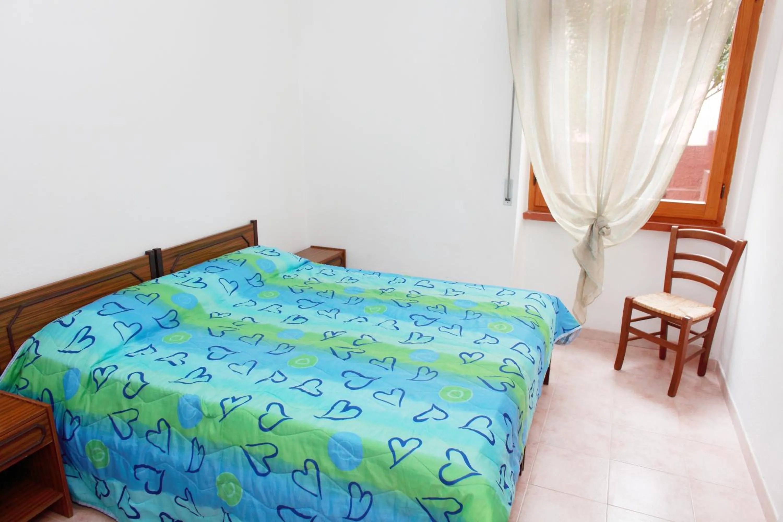 Bedroom, Bed in Appartamenti Mare Blu