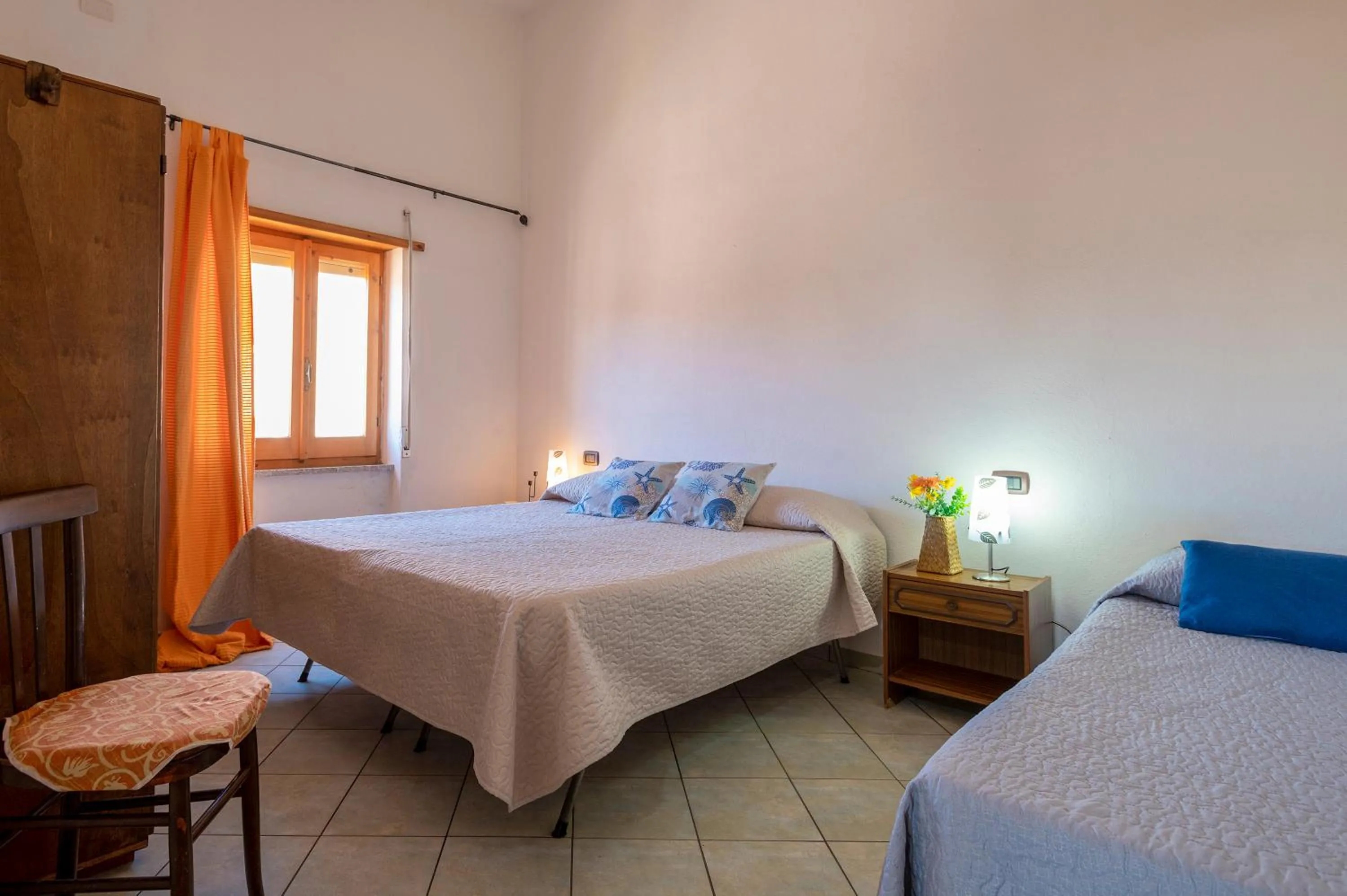 Bed in Appartamenti Mare Blu