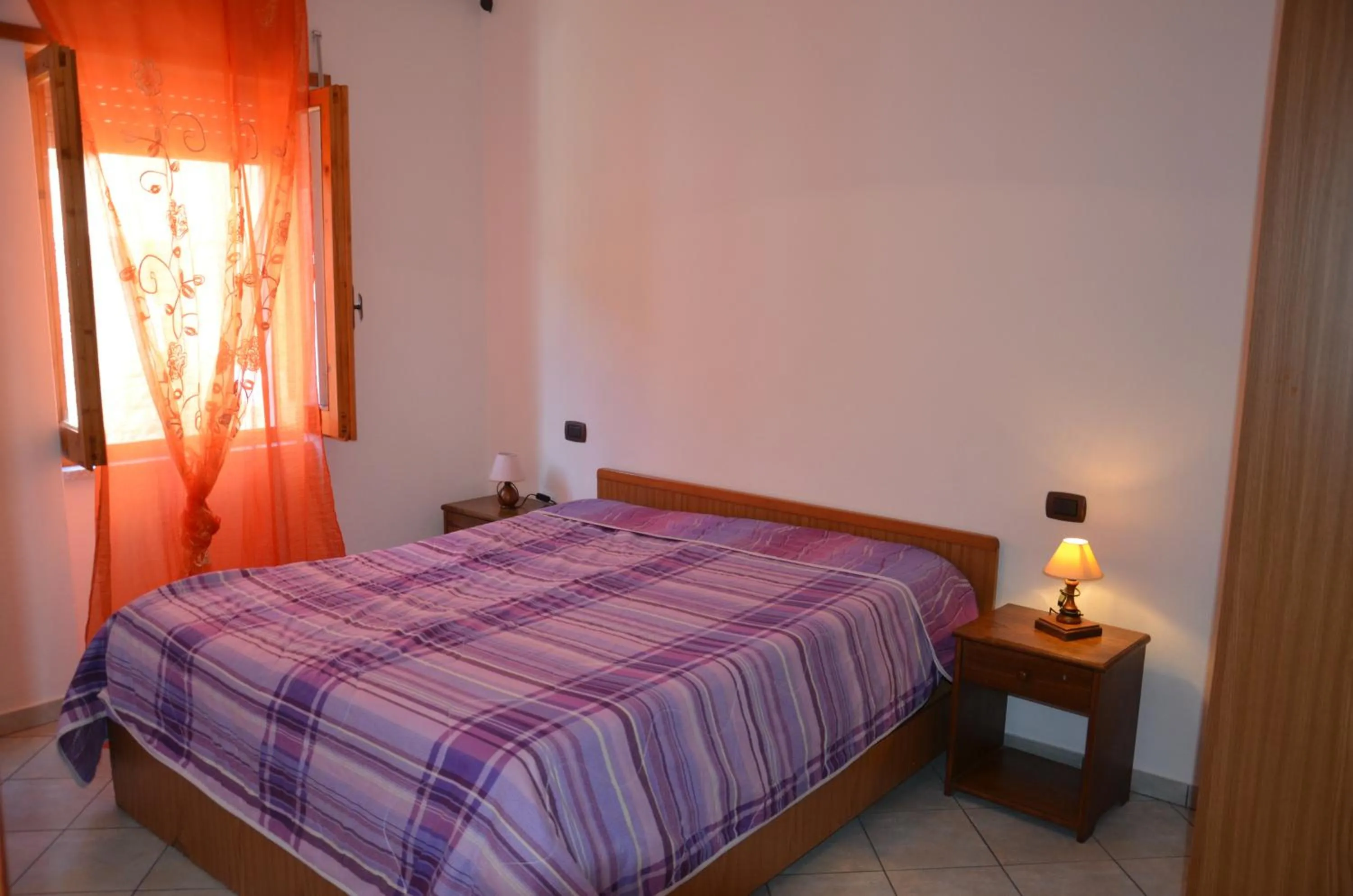 Bedroom, Bed in Appartamenti Mare Blu