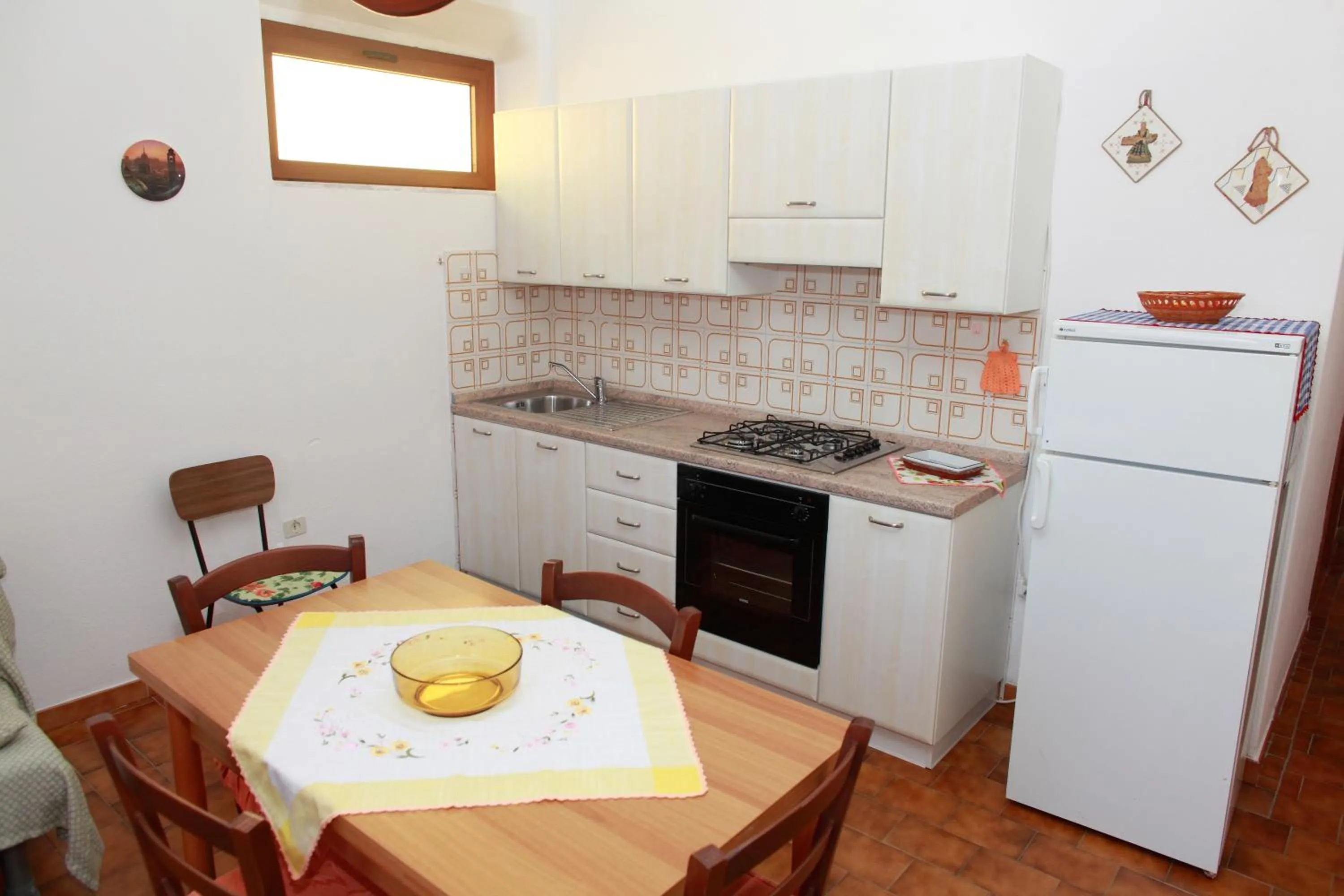Kitchen or kitchenette in Appartamenti Mare Blu