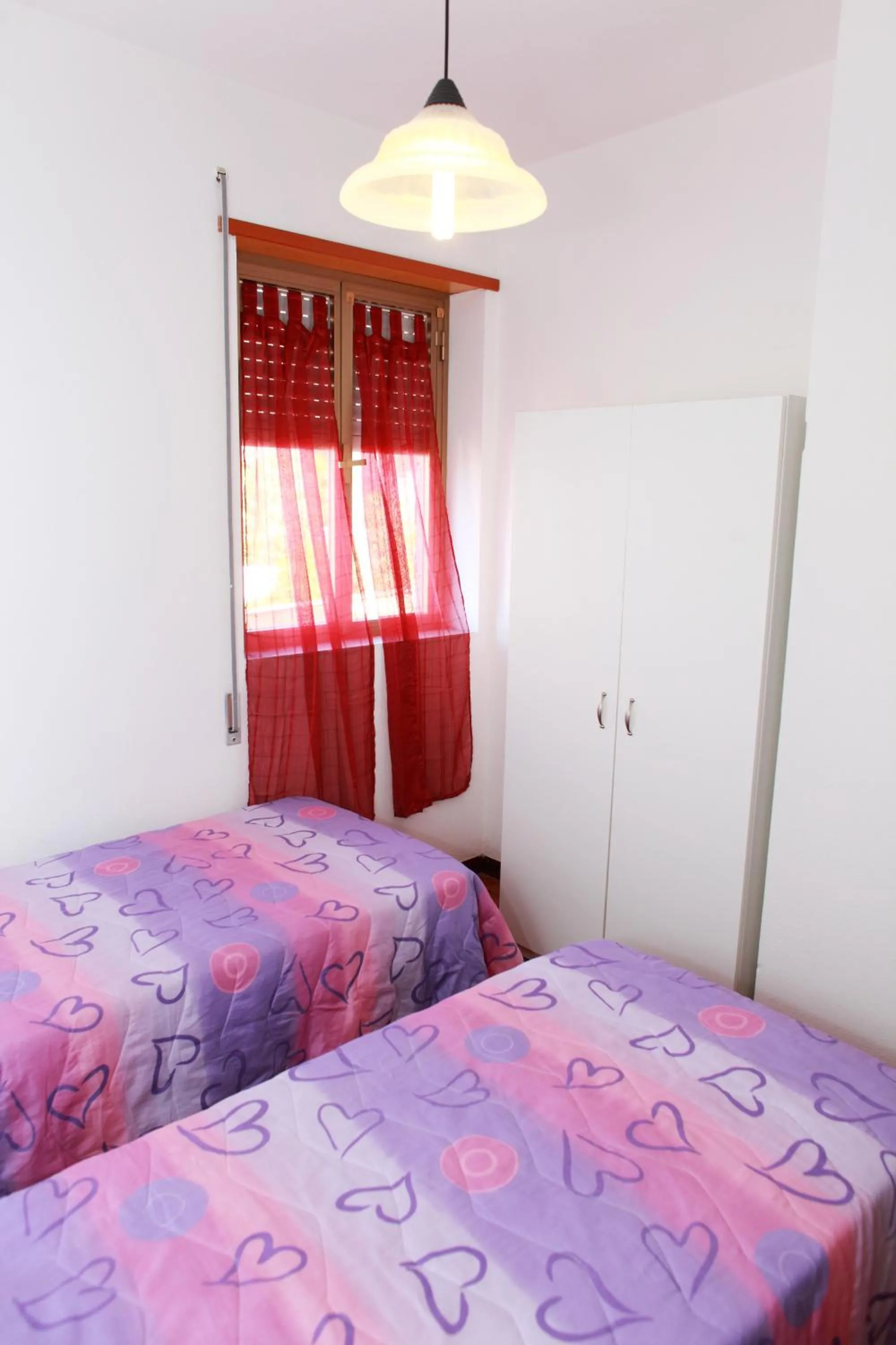 Bedroom, Bed in Appartamenti Mare Blu