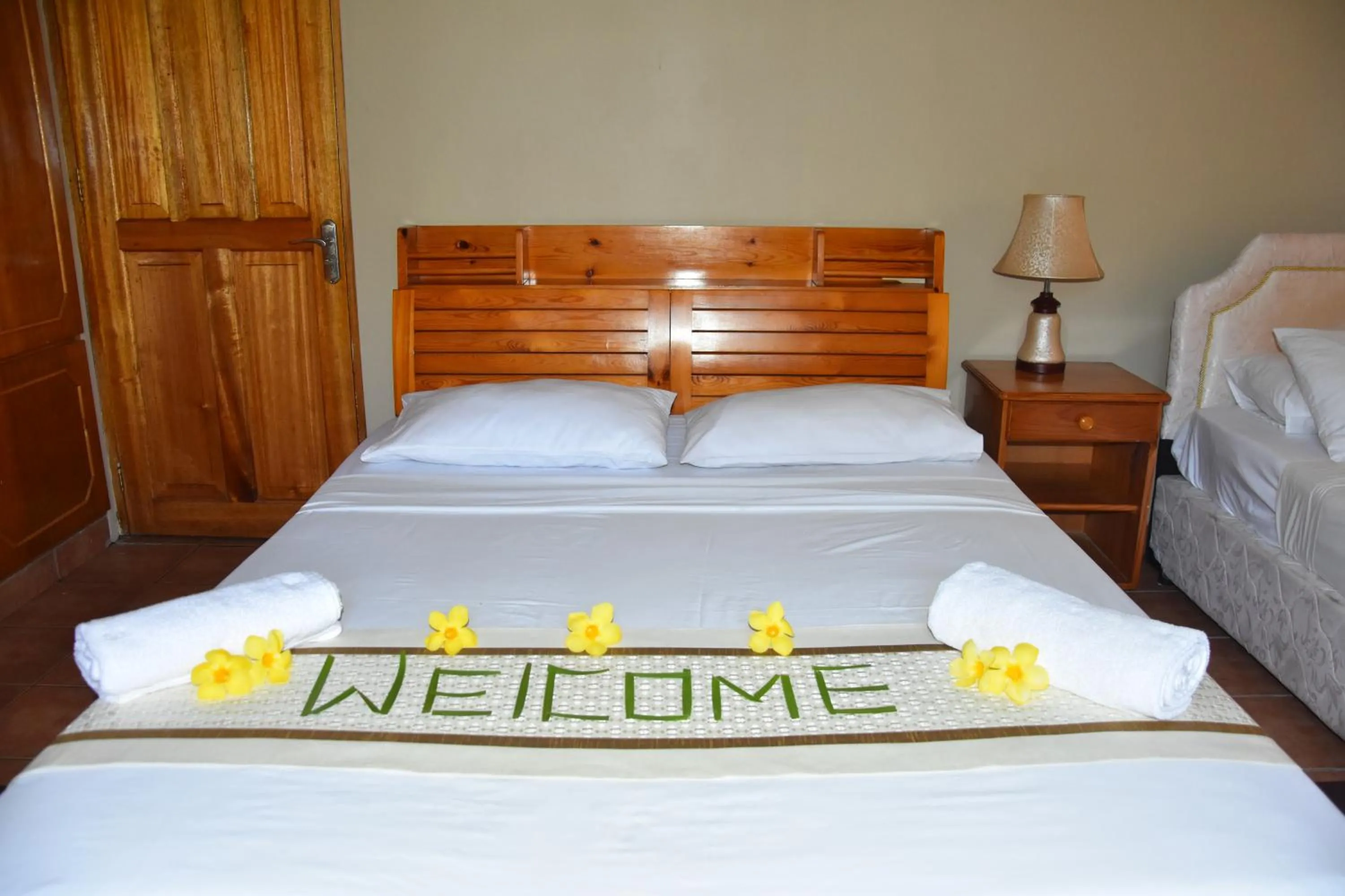 Bed in Reef Holiday Apartments