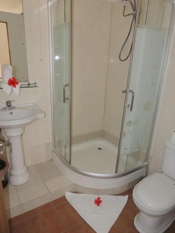 Shower in Reef Holiday Apartments