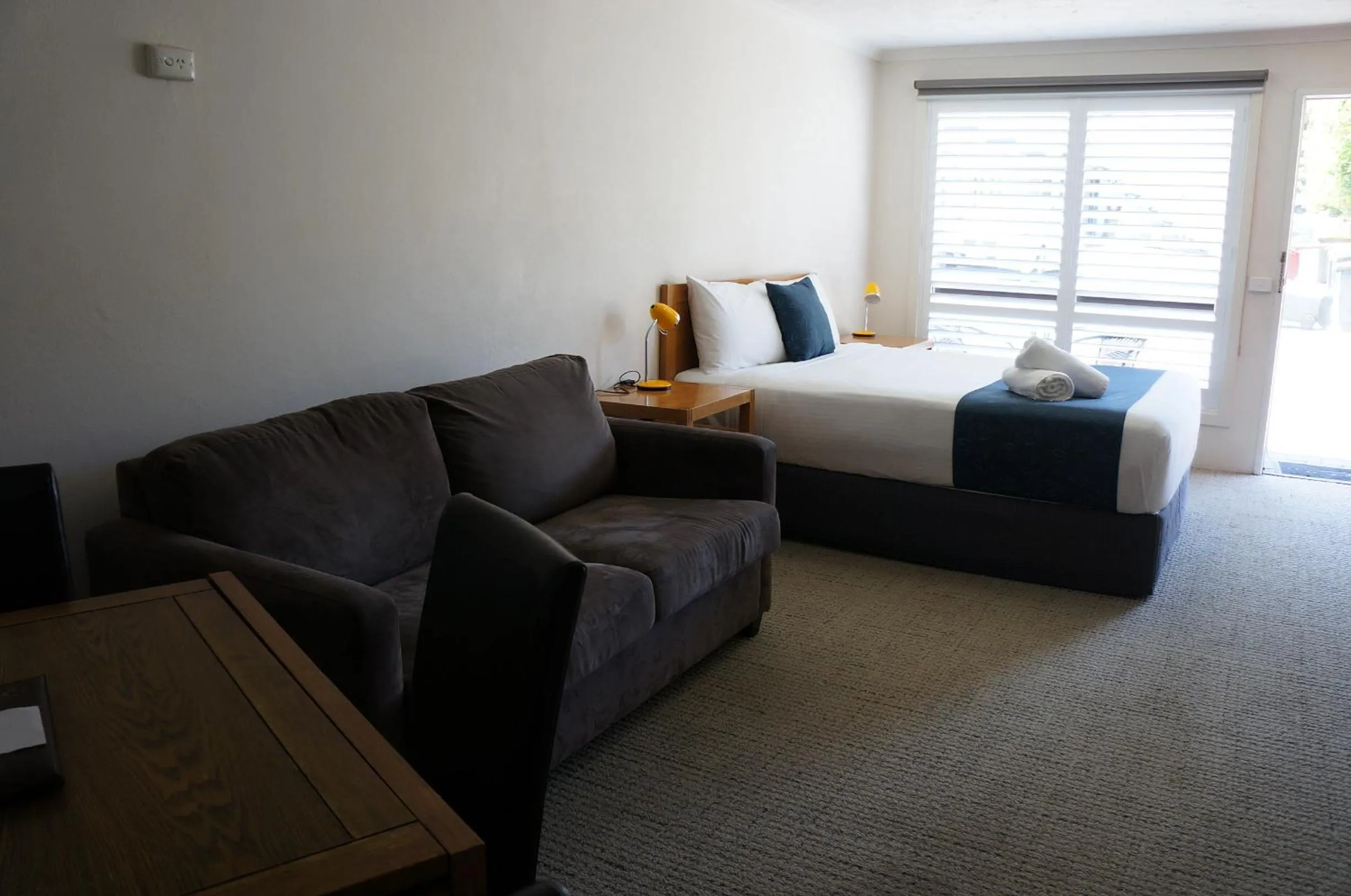 Bed in Waves Motel and Apartments