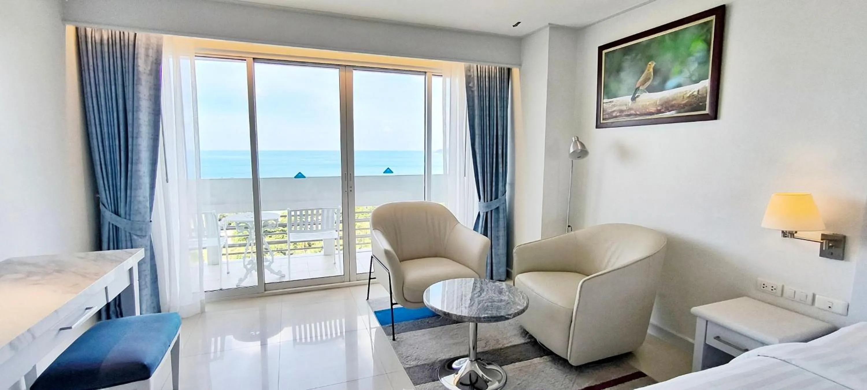 Balcony/Terrace, Bed in Andaman Beach Suites Hotel, Patong Phuket