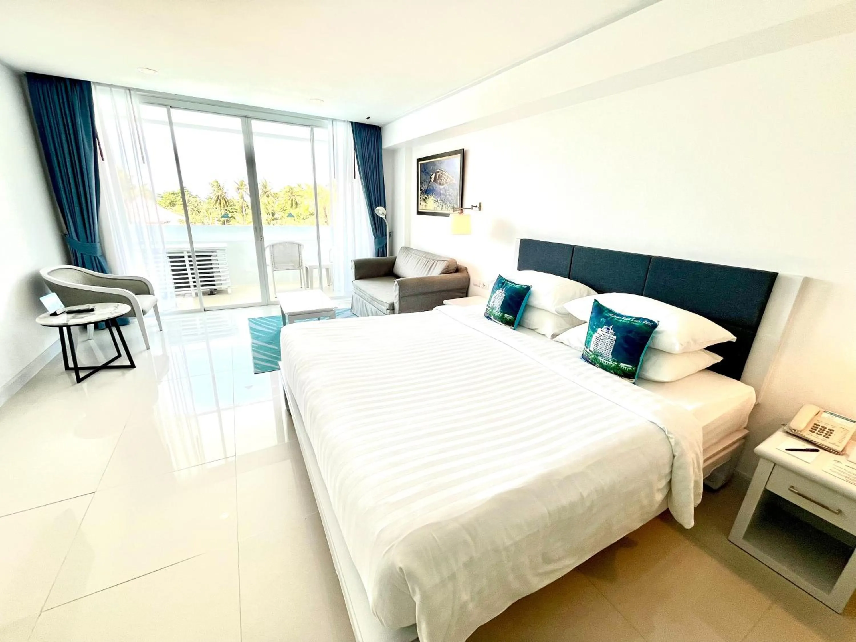 Bed in Andaman Beach Suites Hotel, Patong Phuket