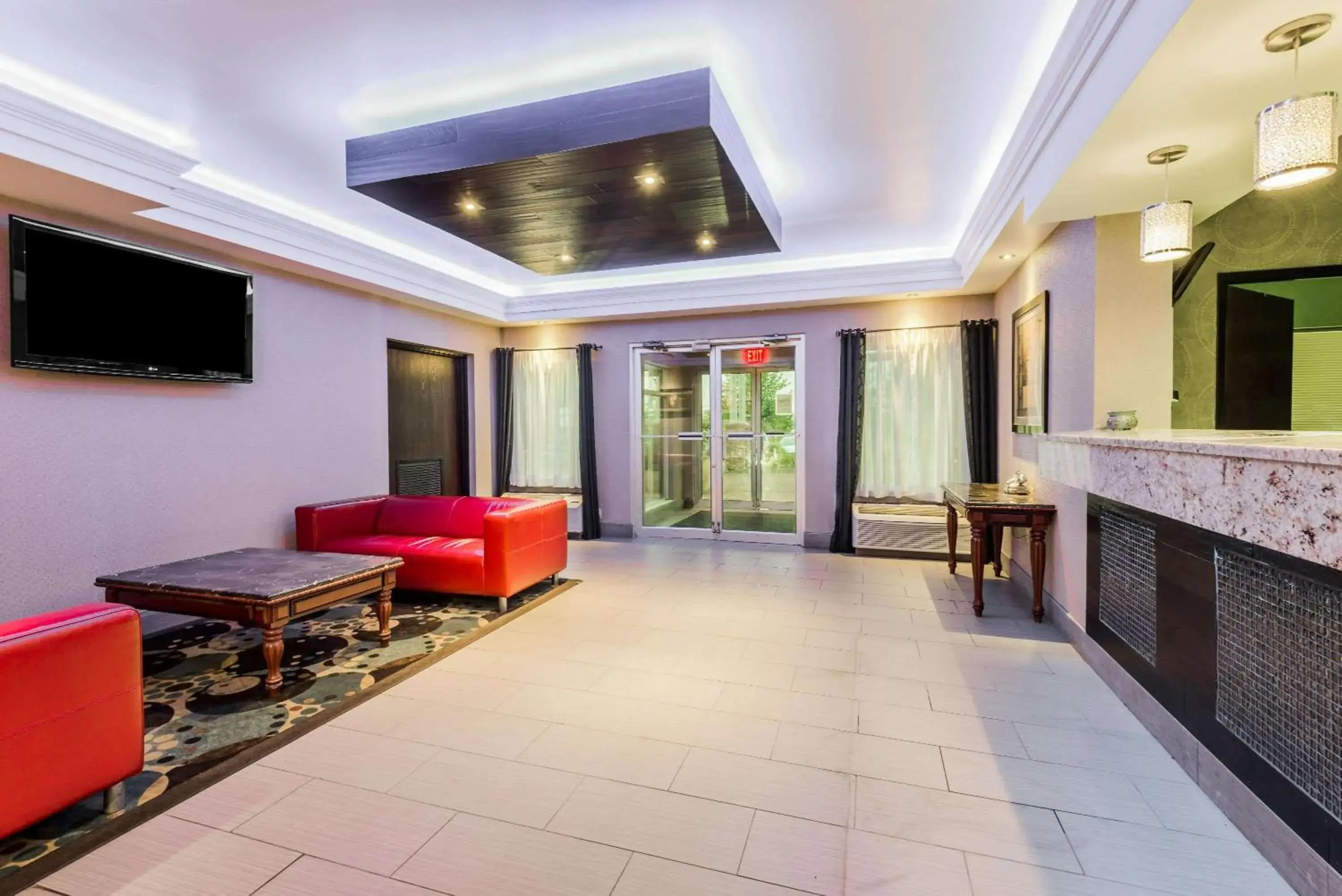 Lobby or reception in Super 8 by Wyndham Mars/Cranberry/Pittsburgh Area Lobby or reception in Super 8 by Wyndham Mars/Cranberry/Pittsburgh Area