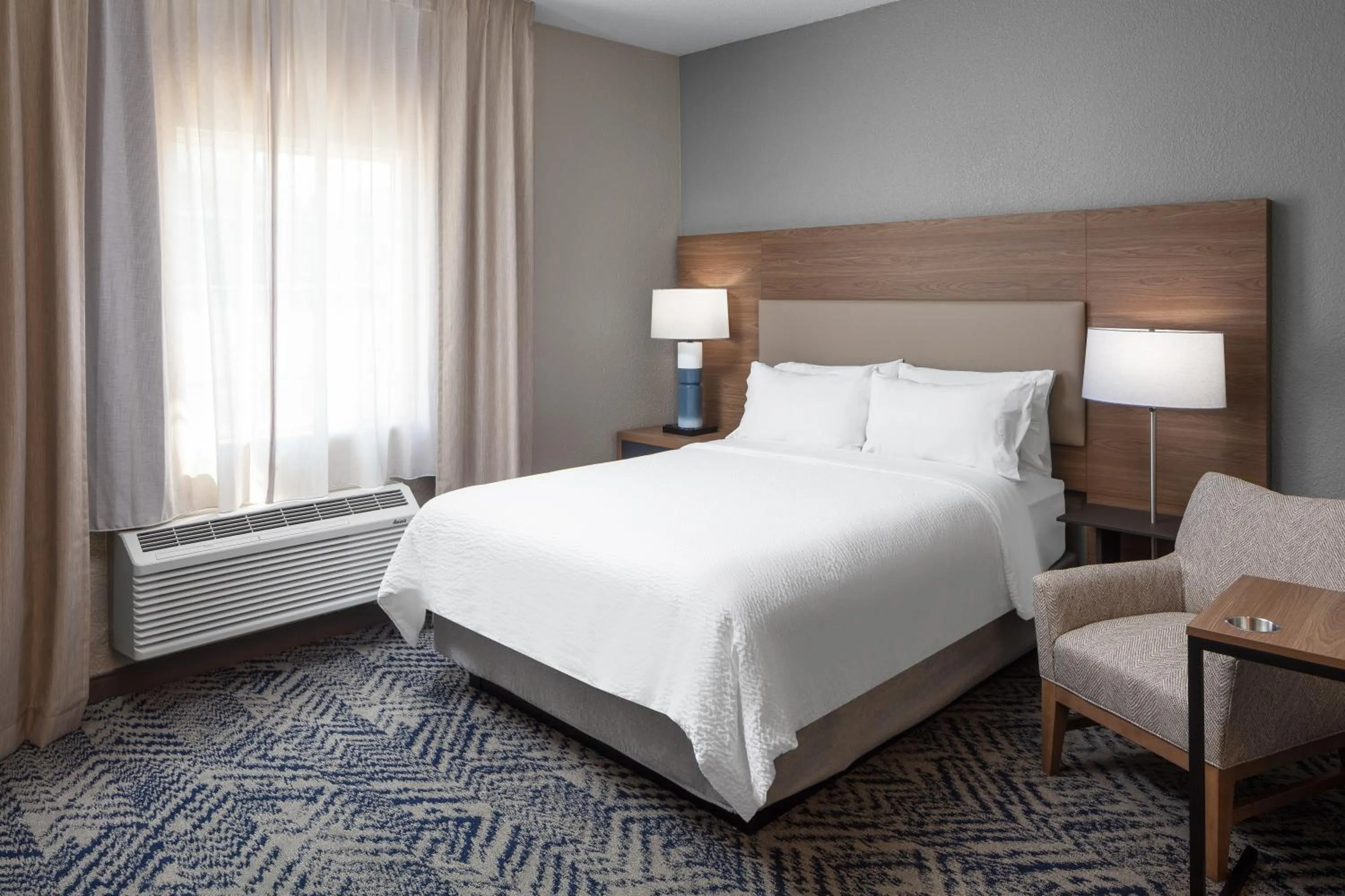 Bed in Candlewood Suites St. Robert by IHG