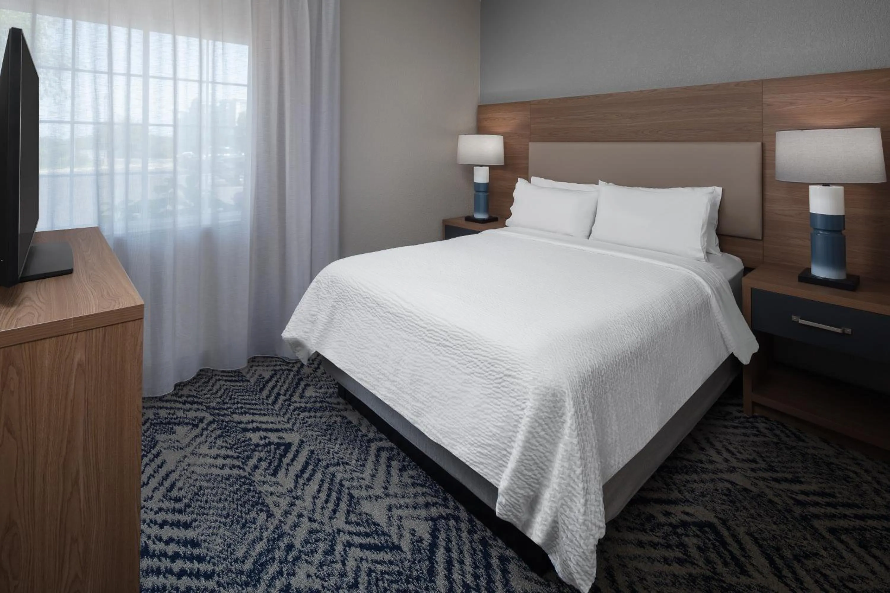Bed in Candlewood Suites St. Robert by IHG