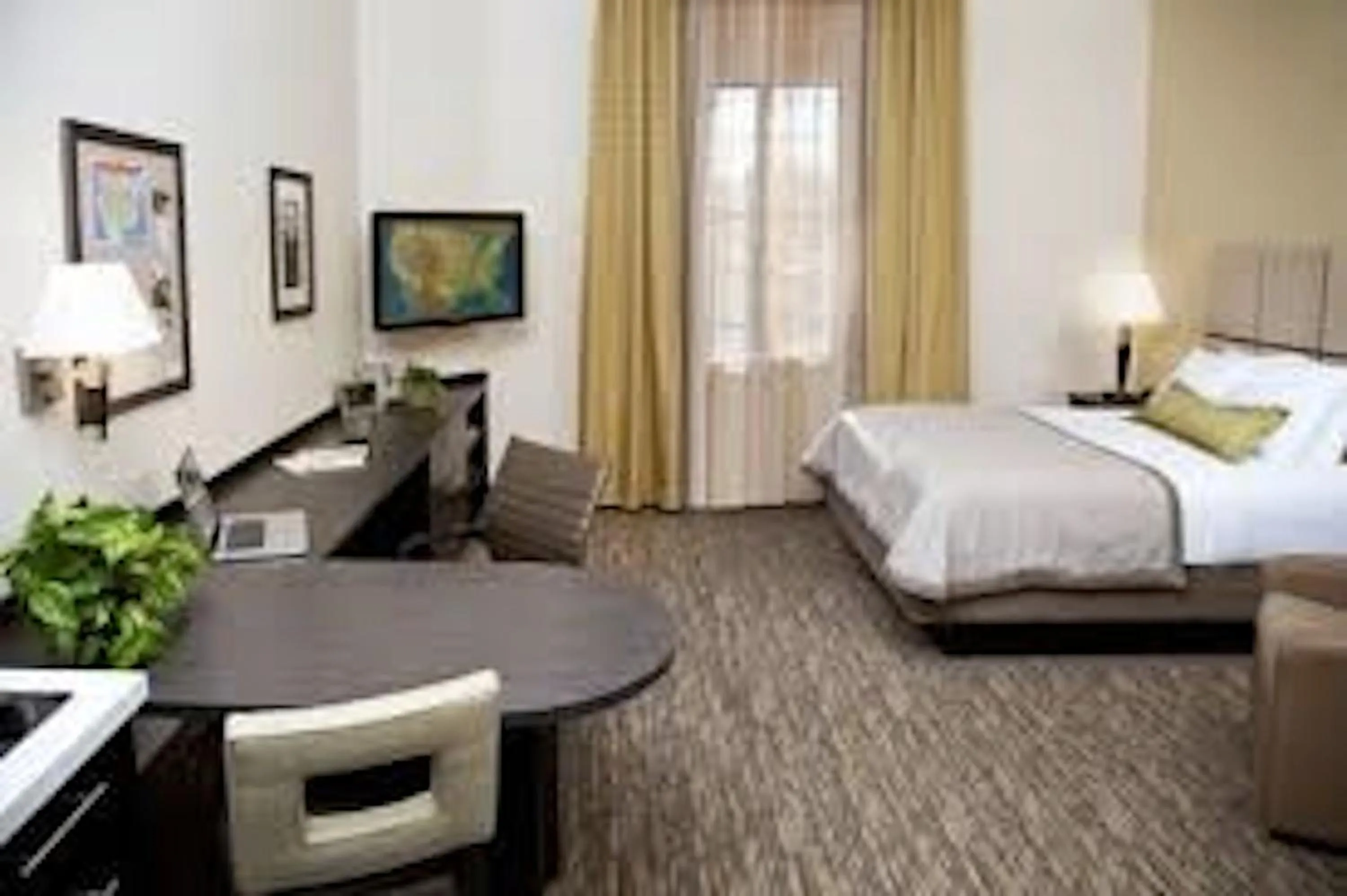 Photo of the whole room, Bed in Candlewood Suites Denver Northeast - Brighton, an IHG Hotel