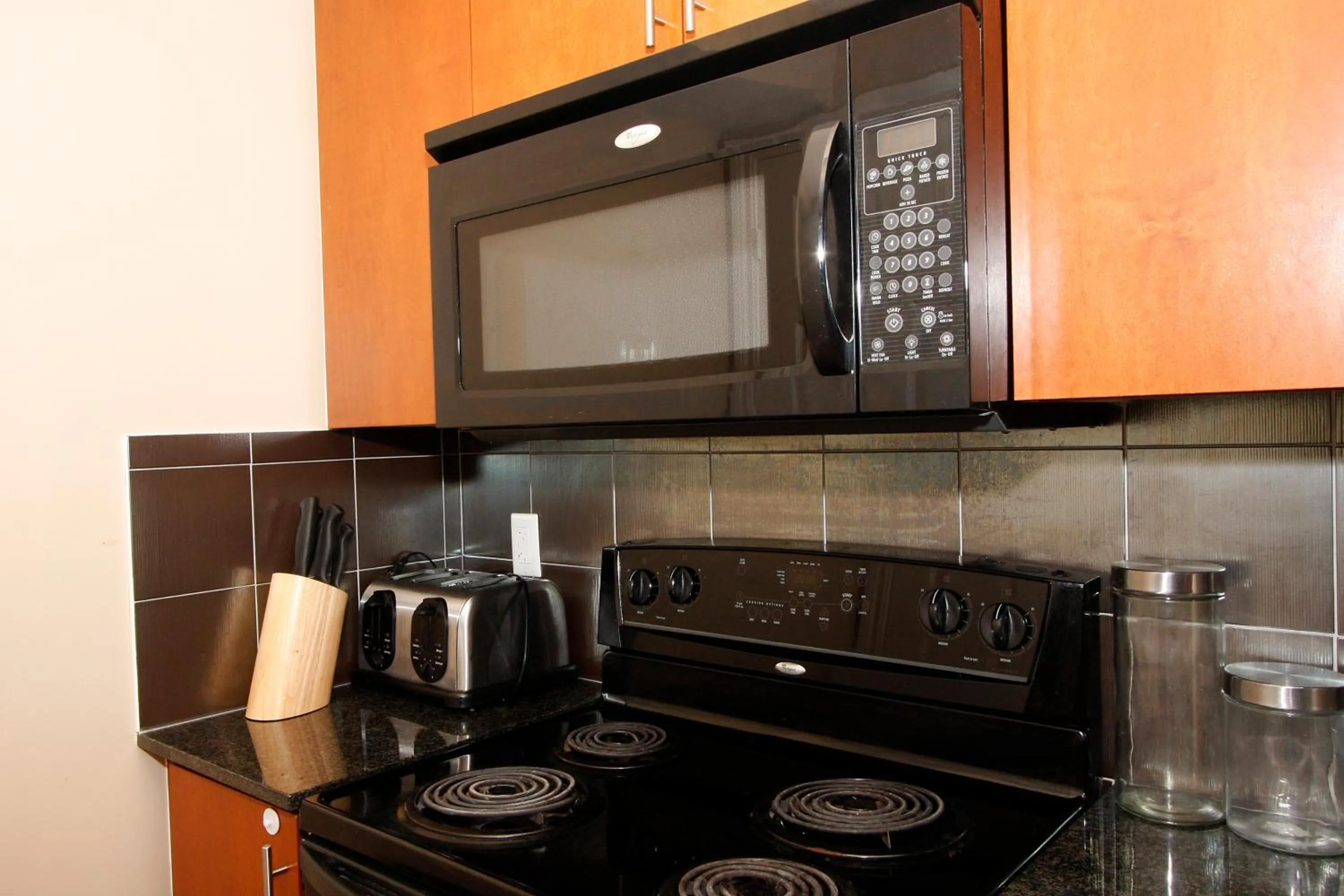 Kitchen or kitchenette in Platinum Suites Furnished Executive Suites