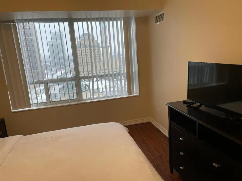 Bed in Platinum Suites Furnished Executive Suites