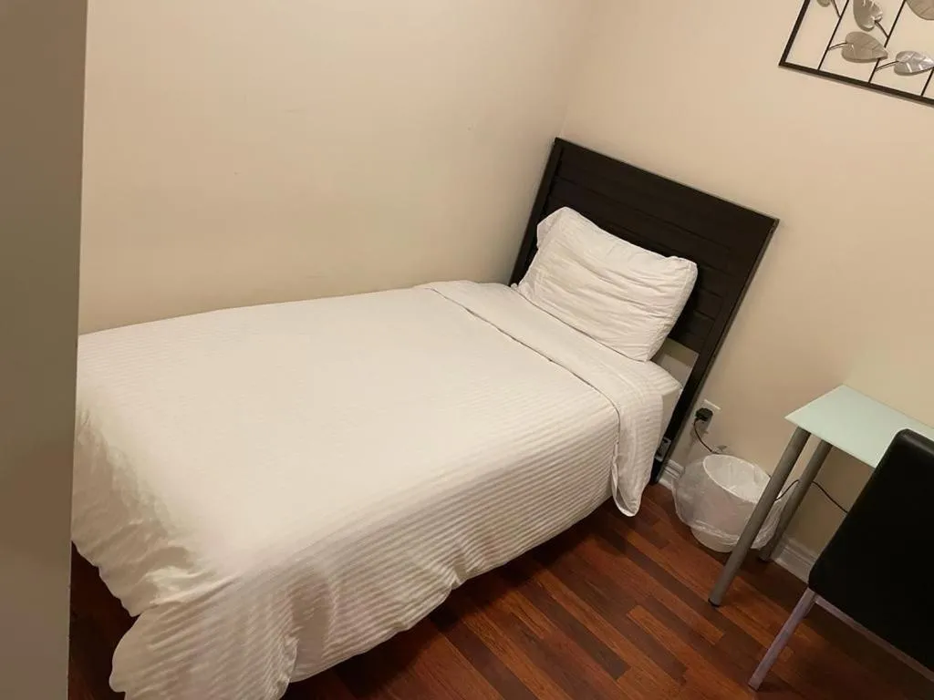 Bed in Platinum Suites Furnished Executive Suites
