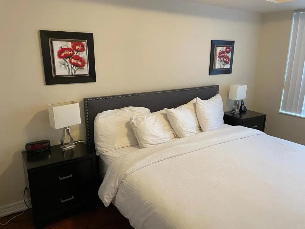 Bed in Platinum Suites Furnished Executive Suites
