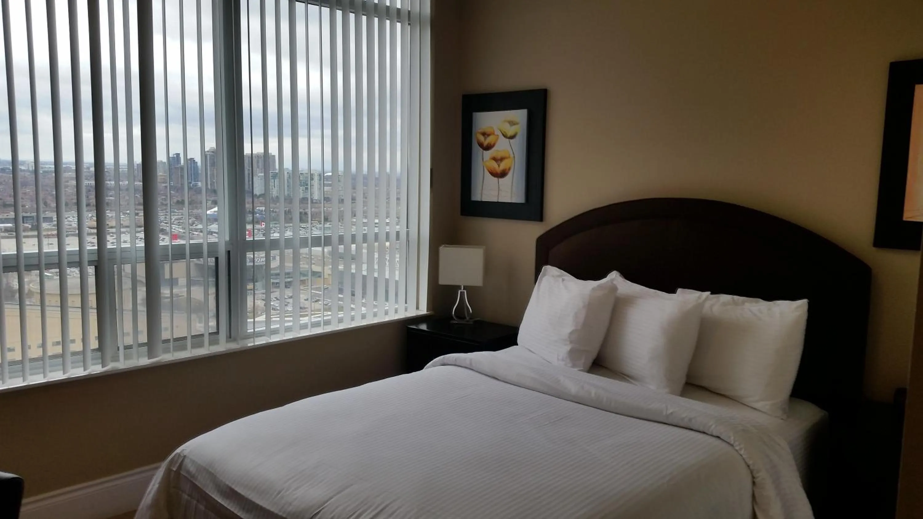 Bed in Platinum Suites Furnished Executive Suites