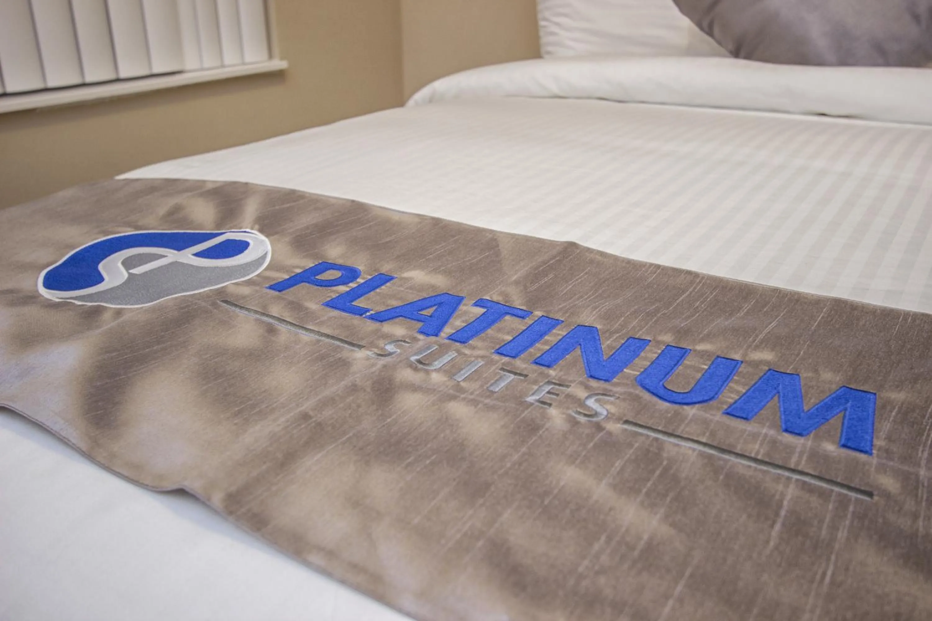Bedroom, Bed in Platinum Suites Furnished Executive Suites