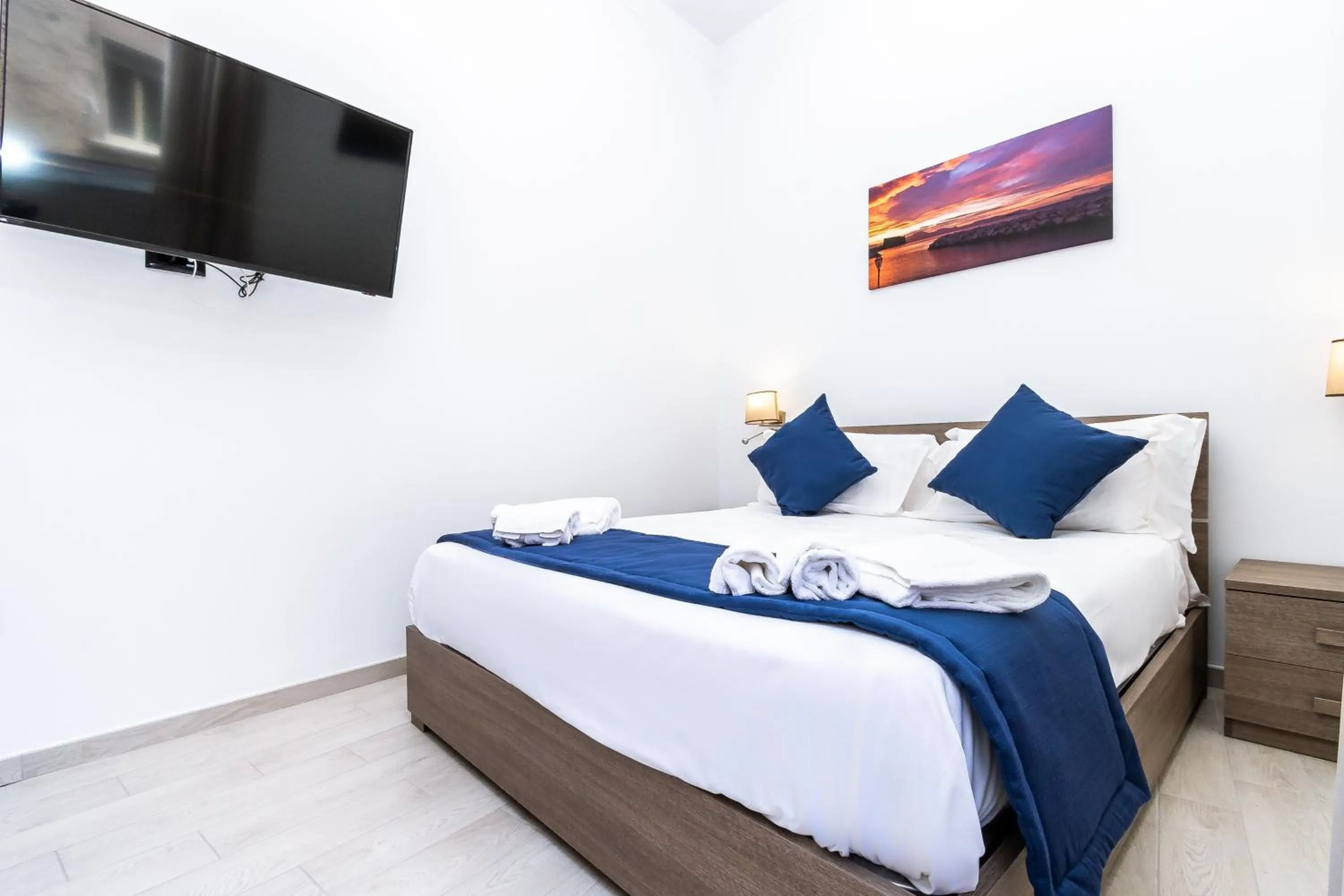 Photo of the whole room, Bed in Palazzo Settembrini 49