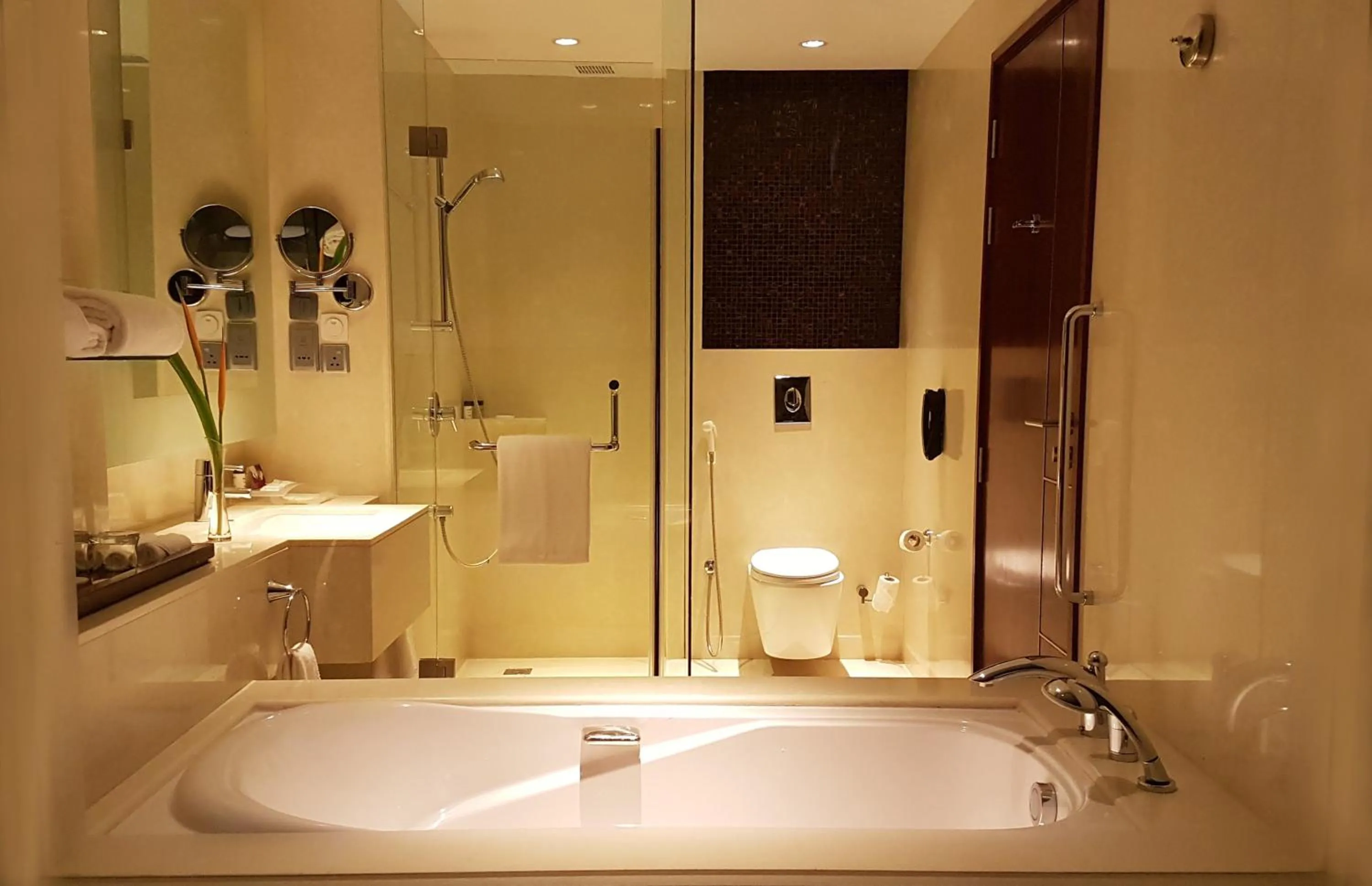 Bathroom in Crowne Plaza Kochi by IHG