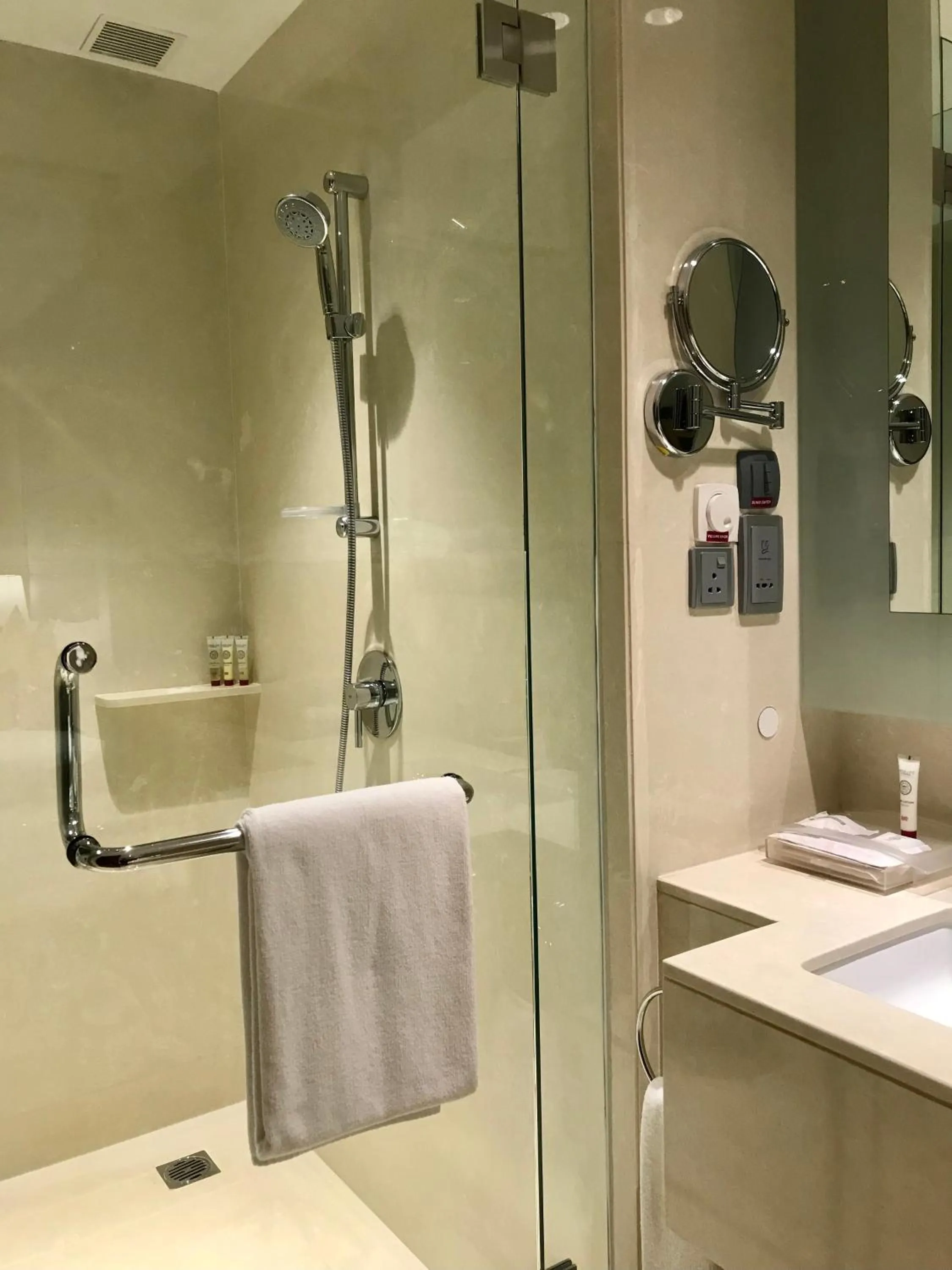 Shower in Crowne Plaza Kochi by IHG