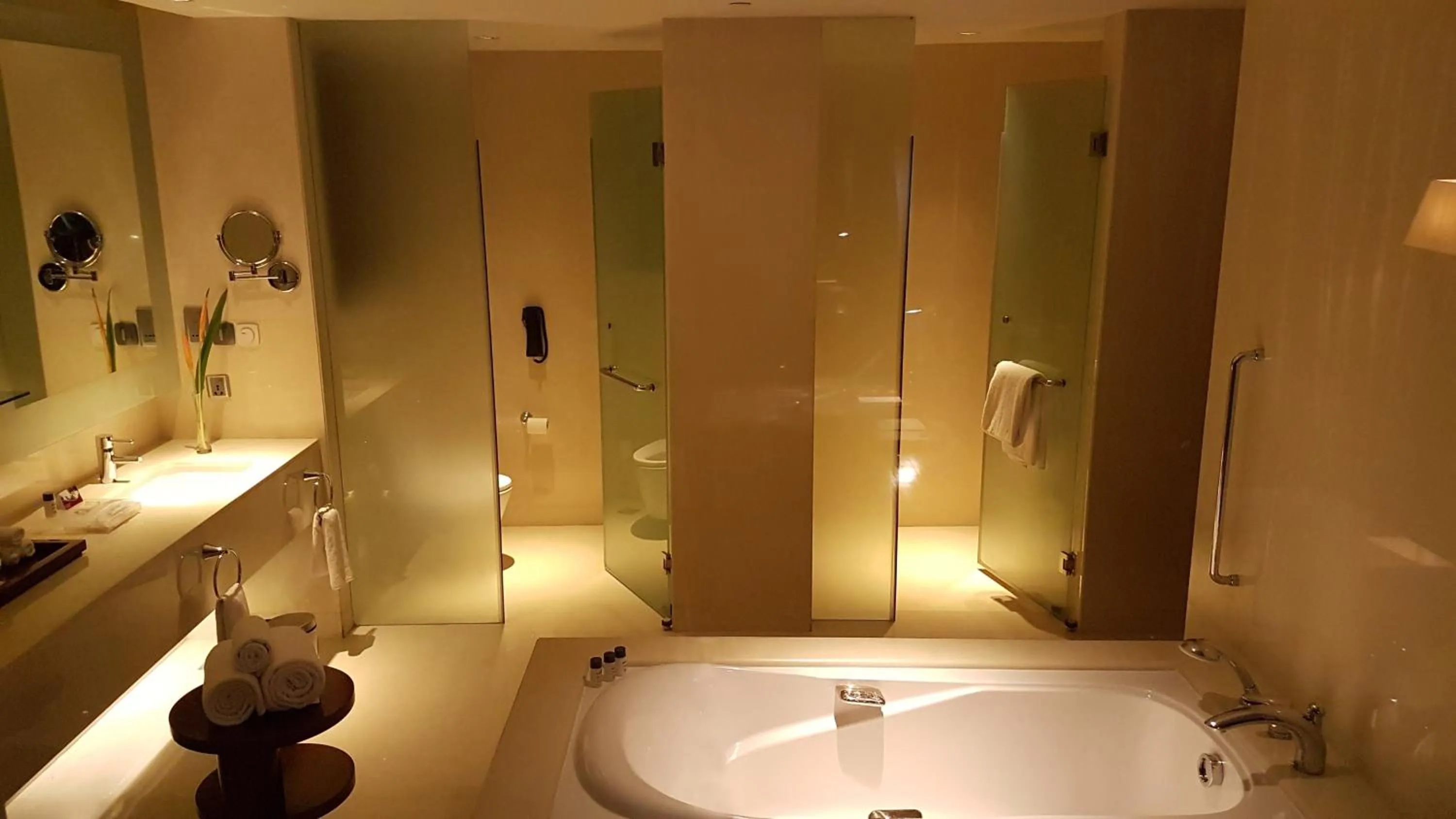 Bathroom in Crowne Plaza Kochi by IHG