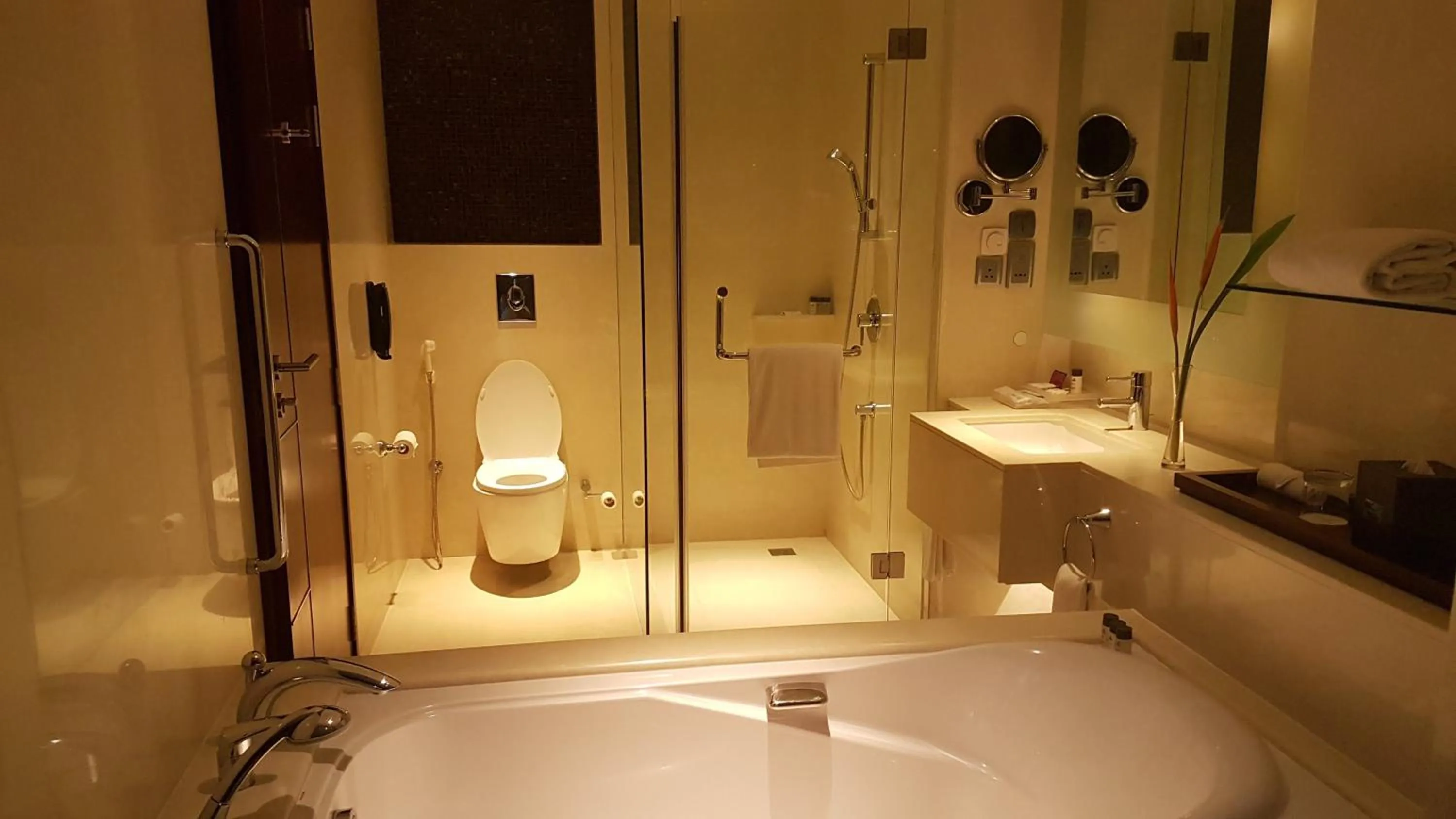 Bathroom in Crowne Plaza Kochi by IHG