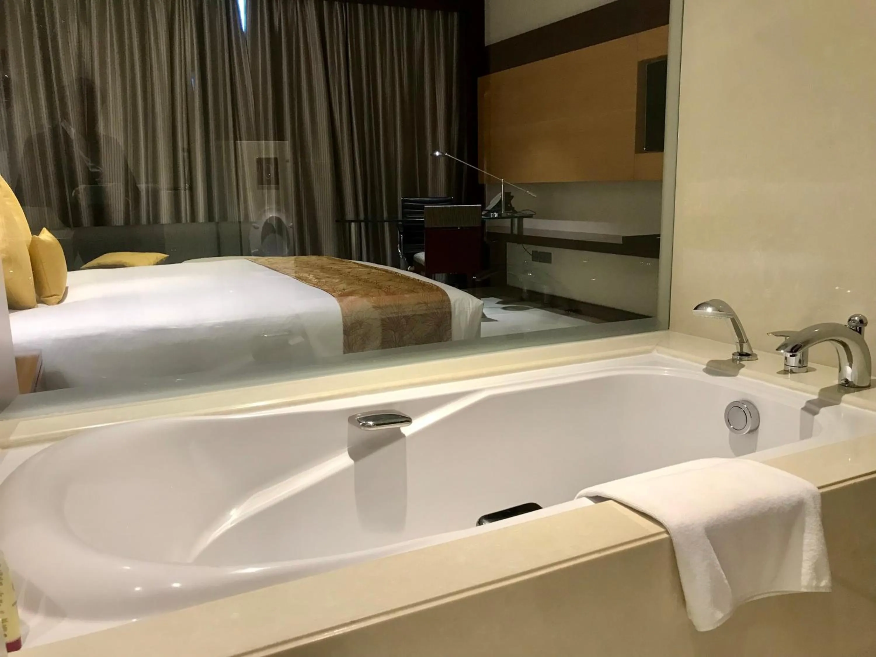 Bathroom, Bed in Crowne Plaza Kochi by IHG