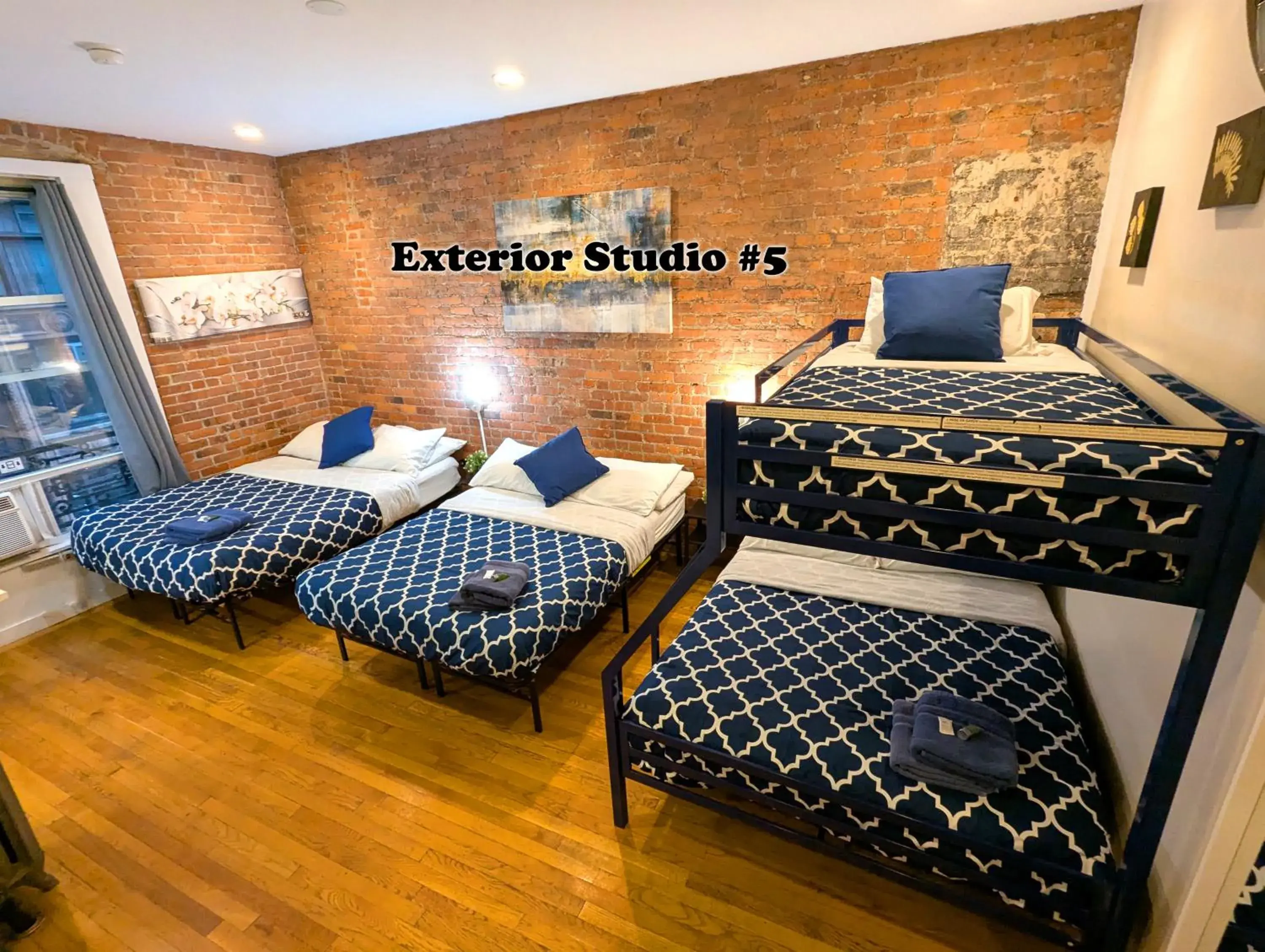 Family Exterior Studio #5 in NYC Empire Apartments Family Exterior Studio #5 in NYC Empire Apartments