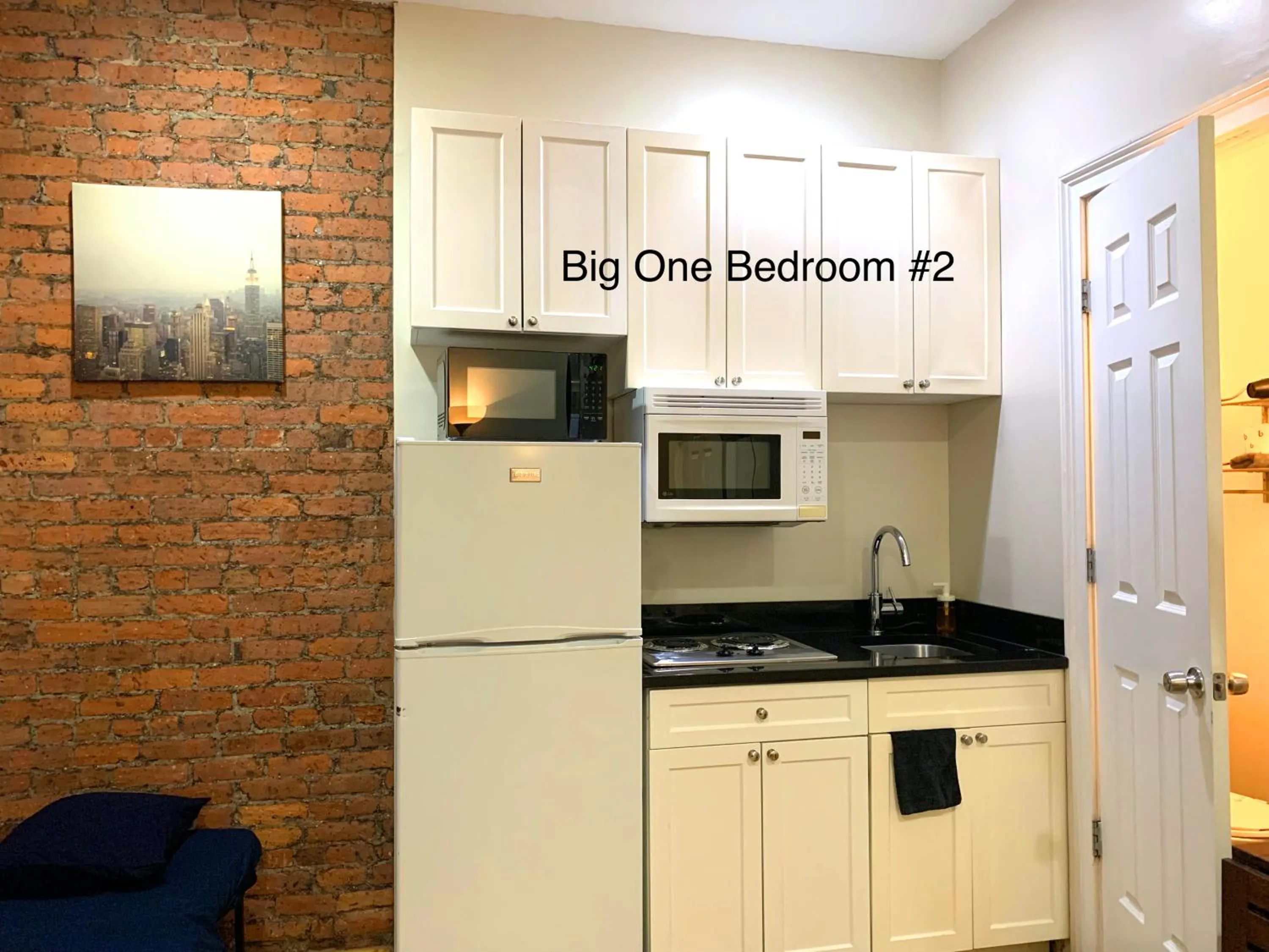 Kitchen or kitchenette in NYC Empire Apartments