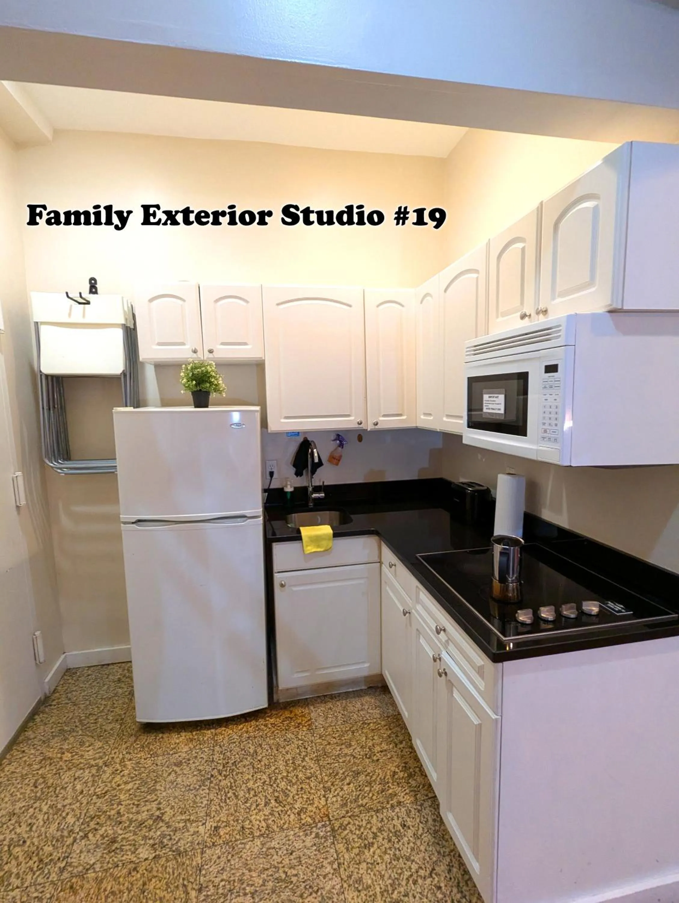 Kitchen or kitchenette in NYC Empire Apartments