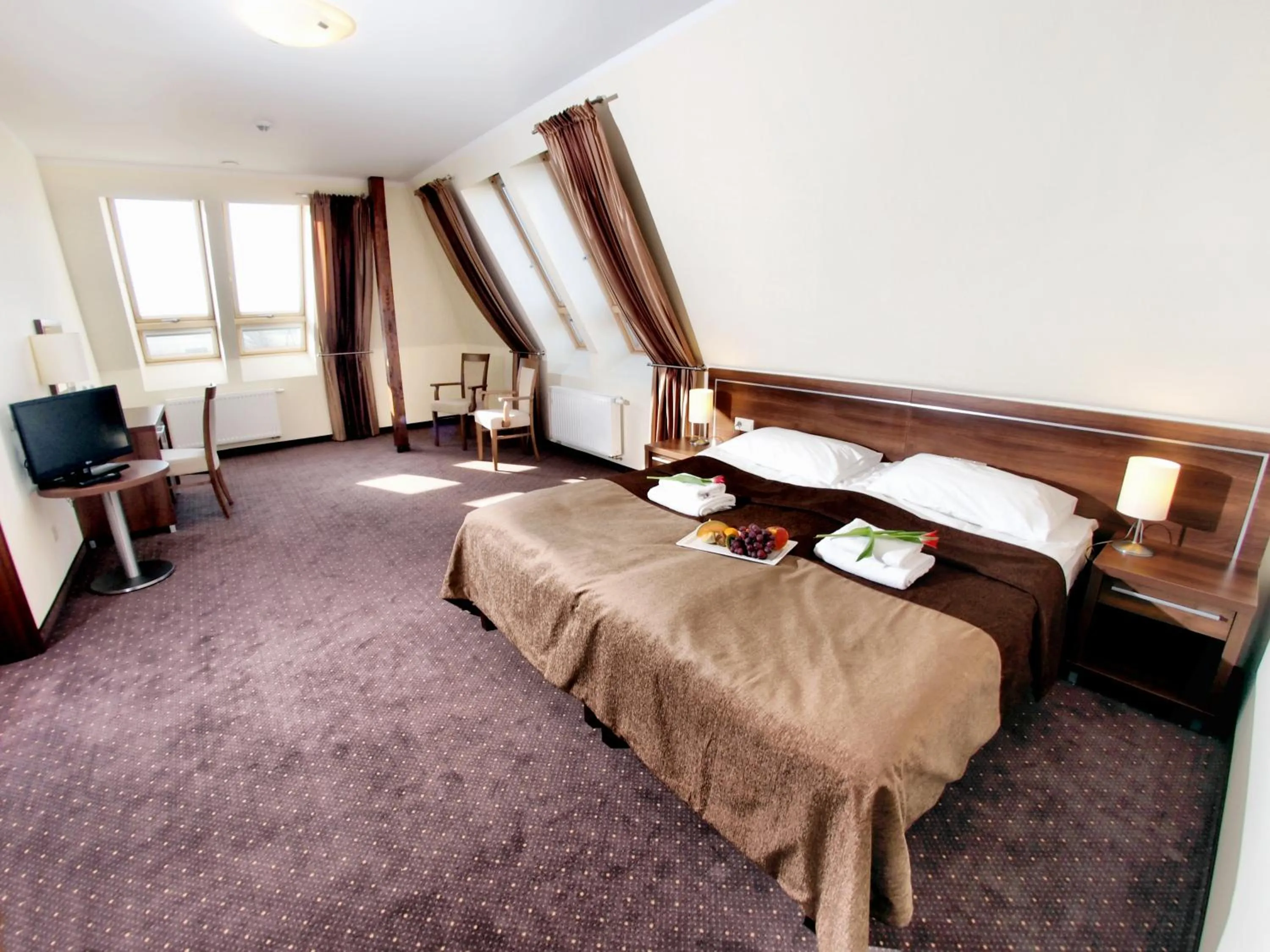 Bed in Hotel Austeria Conference & Spa