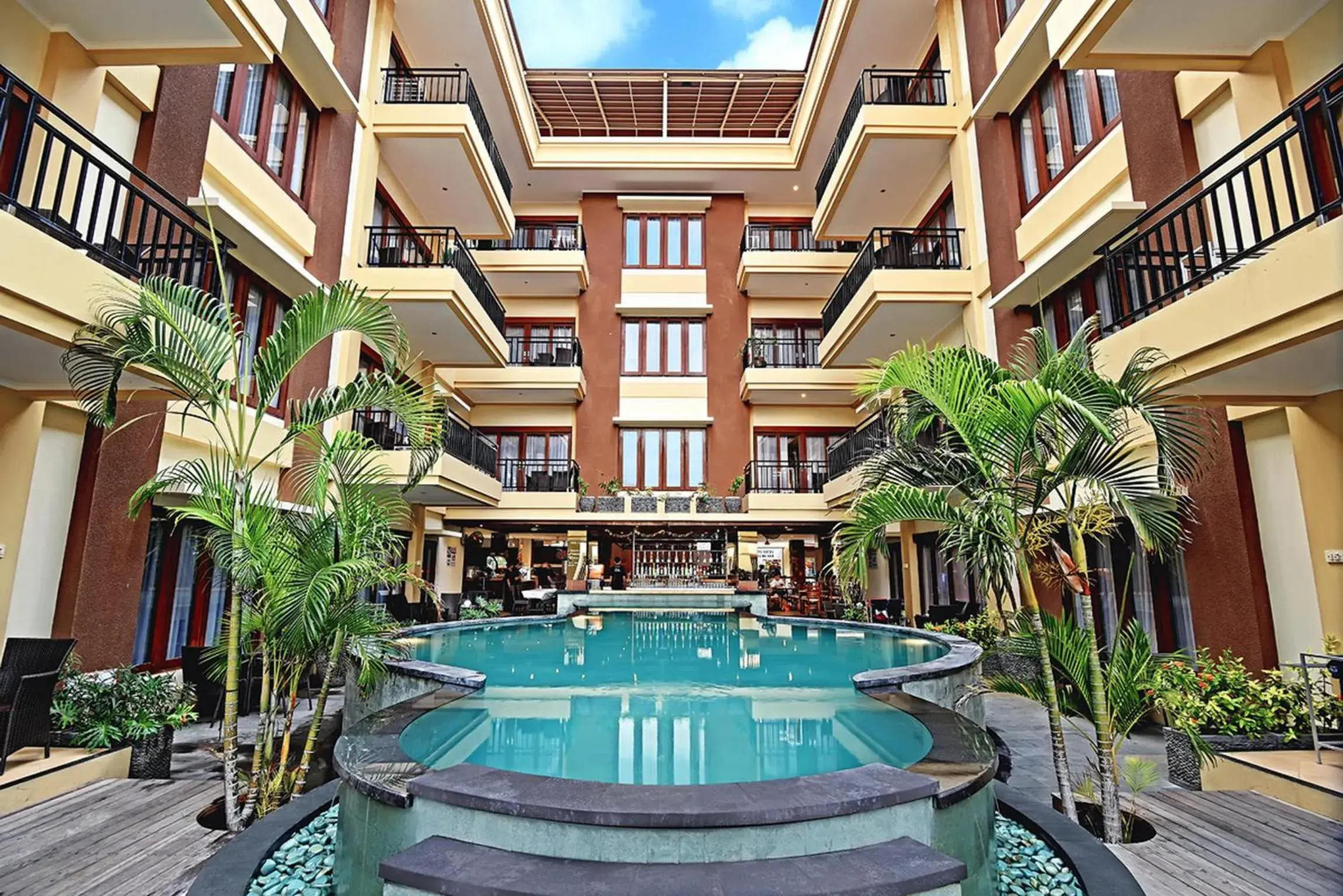 Swimming pool in Kuta Town House Apartments Swimming pool in Kuta Town House Apartments