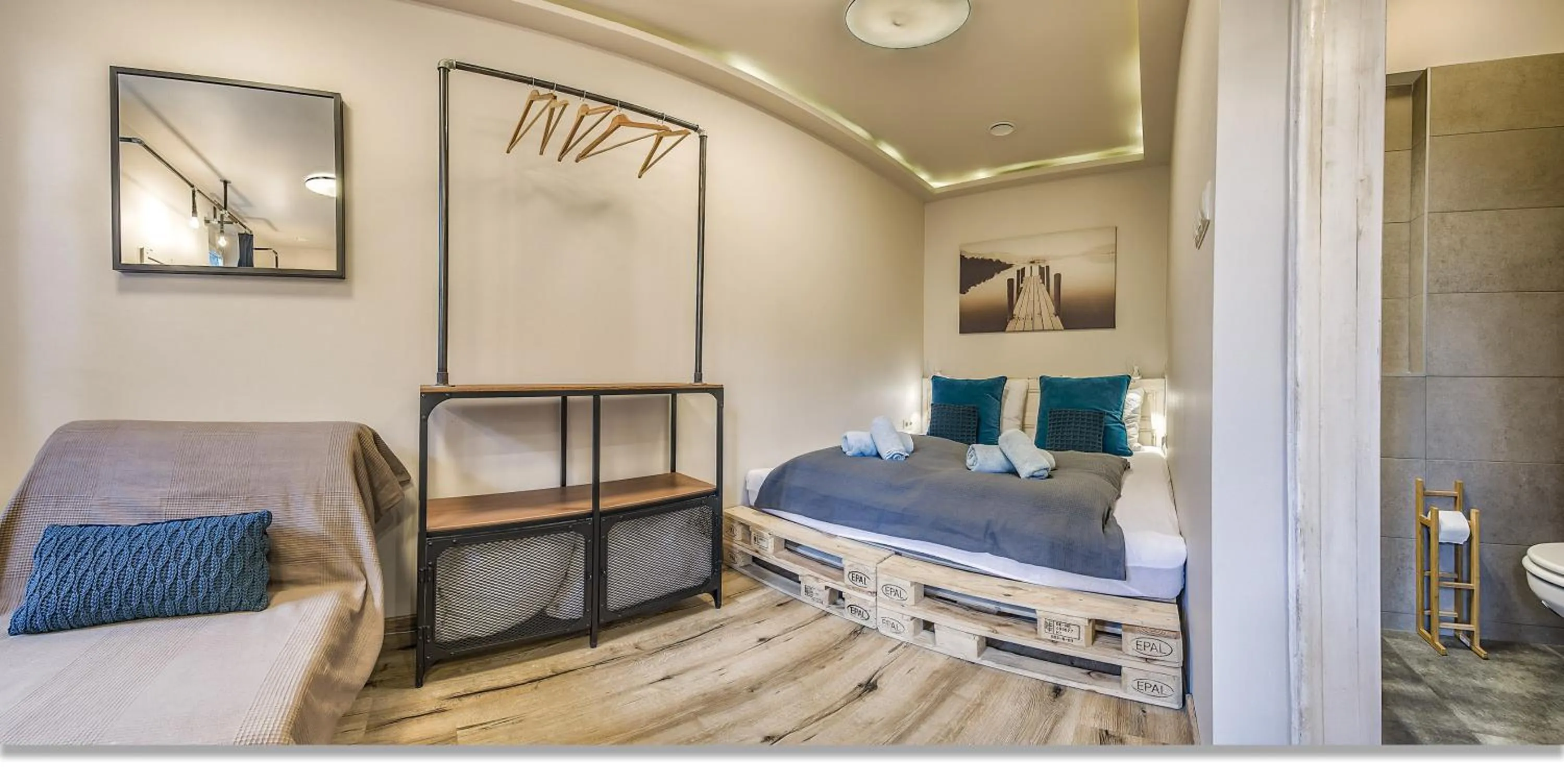Bed in Downtown Boutique Suite