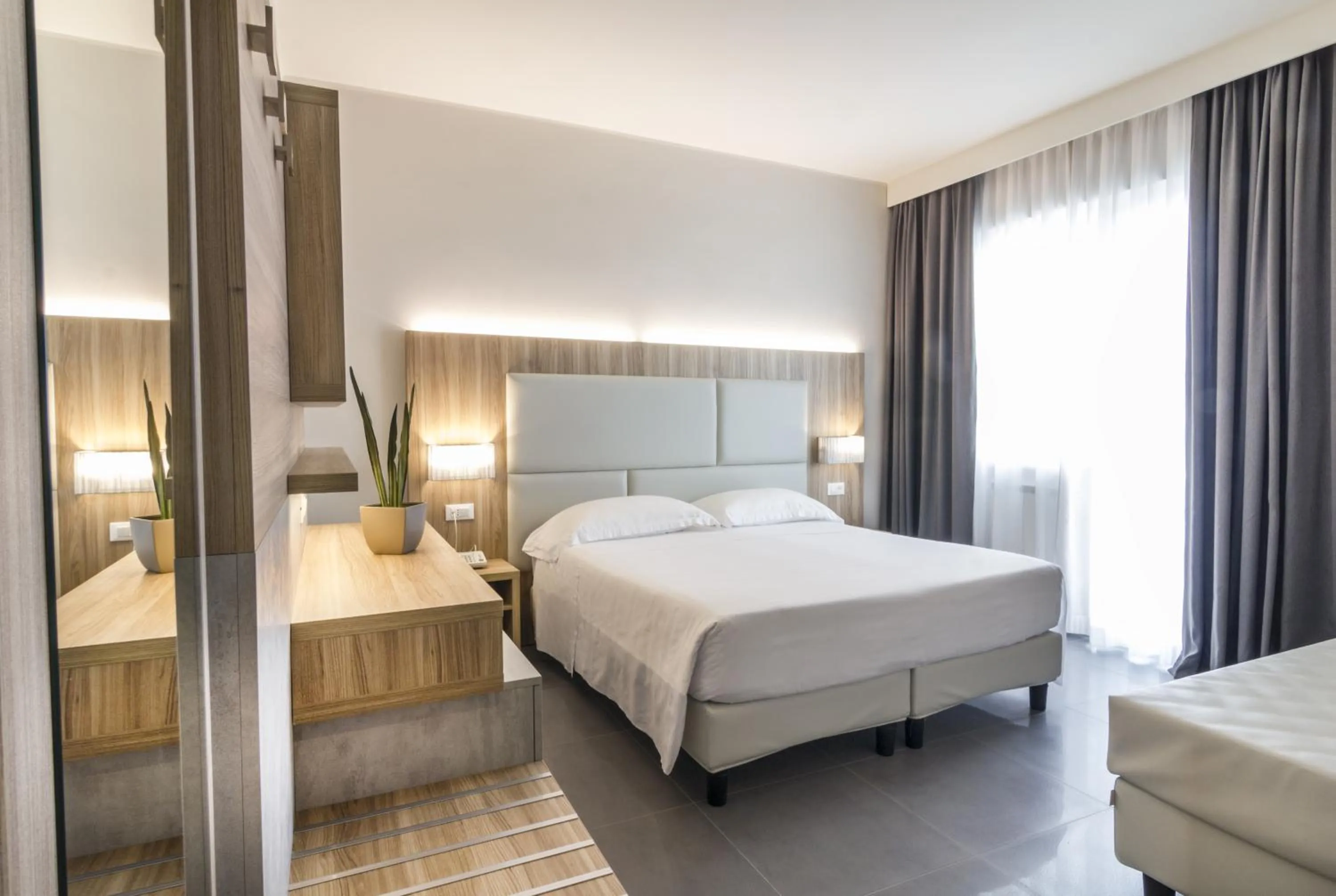 Bed in Hotel Meridiano