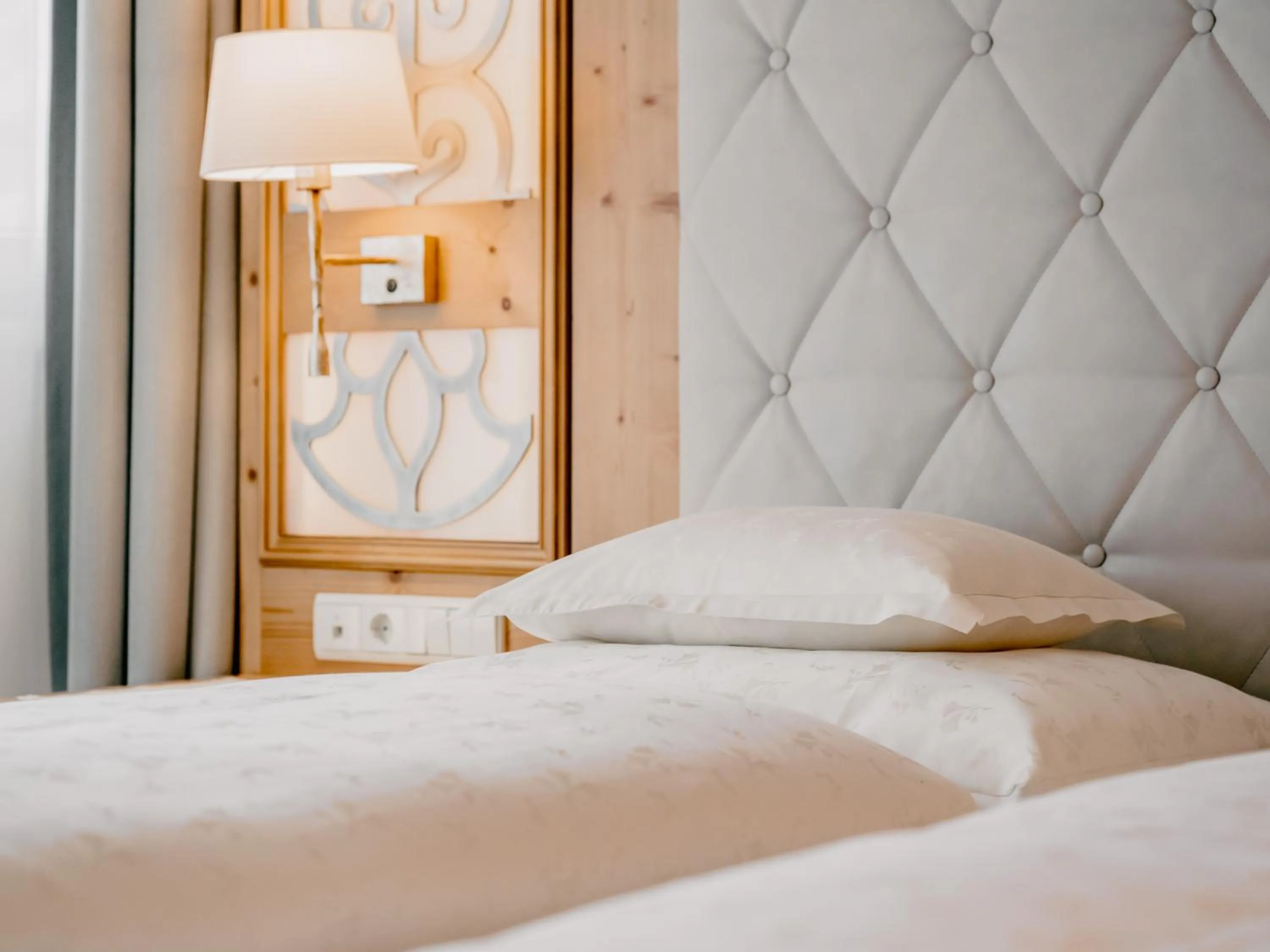 Bed in Gourmet & Wine Hotel Austria - 4 Sterne superior - Ski In Ski Out