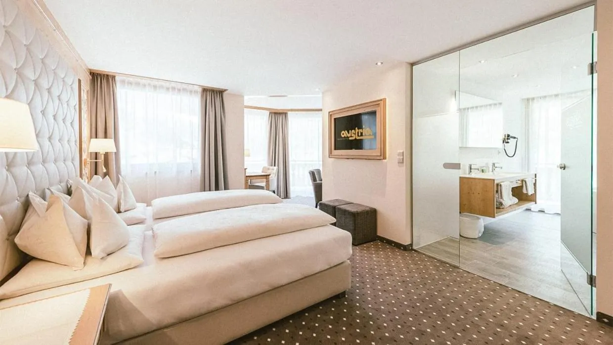 Bed in Gourmet & Wine Hotel Austria - 4 Sterne superior - Ski In Ski Out