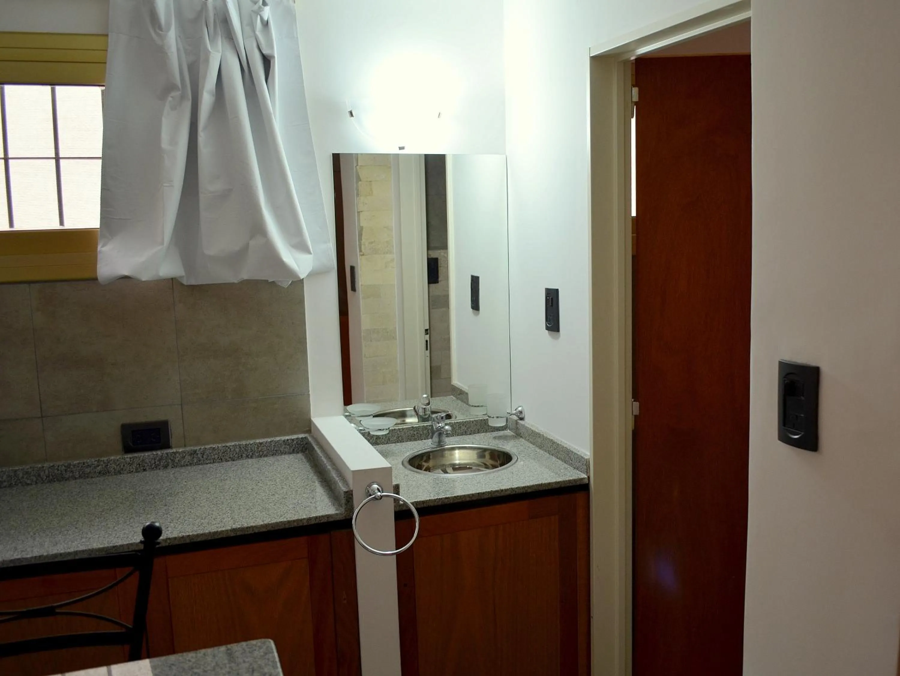 Vía Lavalle Suites