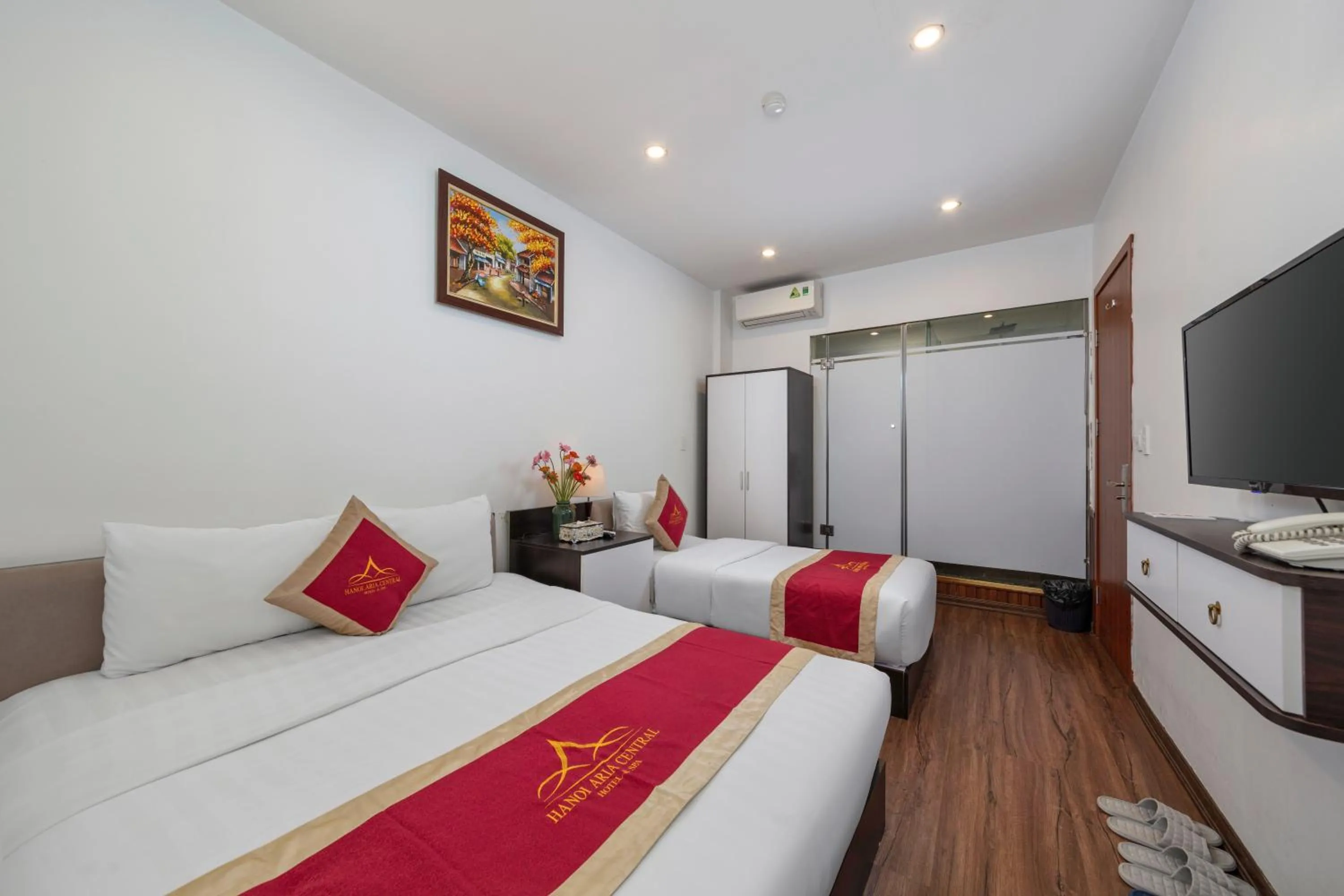 Communal lounge/ TV room, Bed in Hanoi Aria Central Hotel & Spa