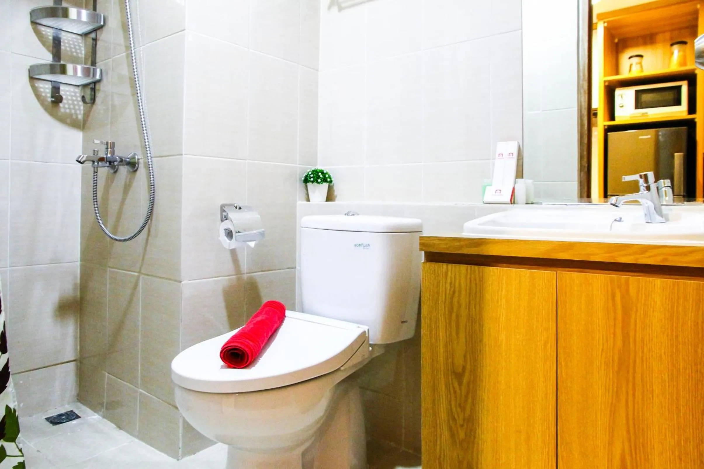 Bathroom in Scandinavian Japanese Style Studio The Oasis Apartment By Travelio