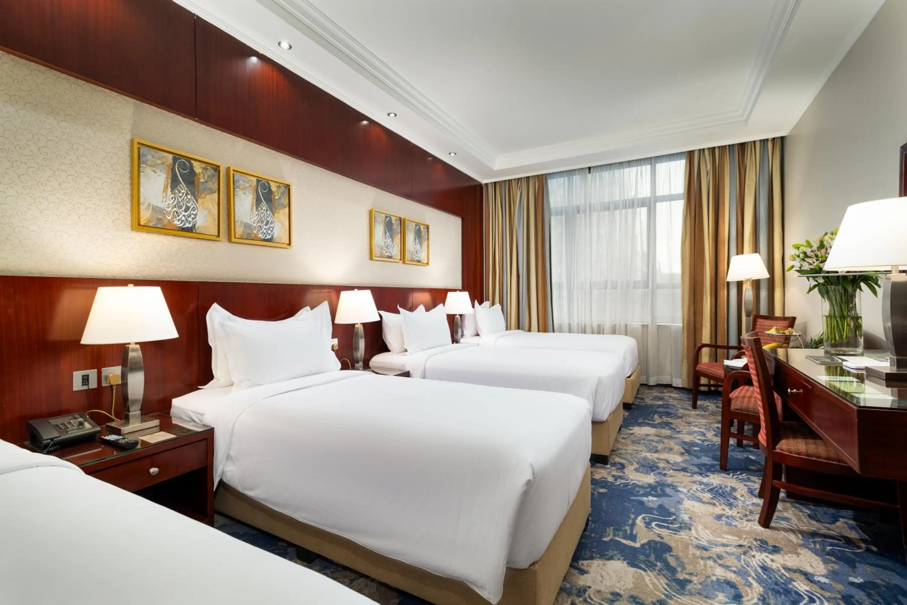 Bed in Emaar Royal Hotel