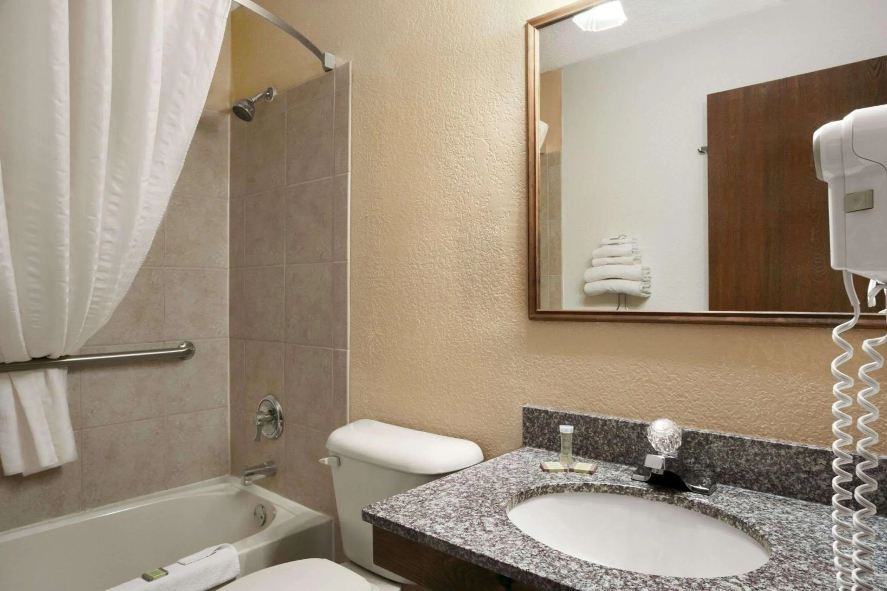 Bathroom in Super 8 by Wyndham New Castle