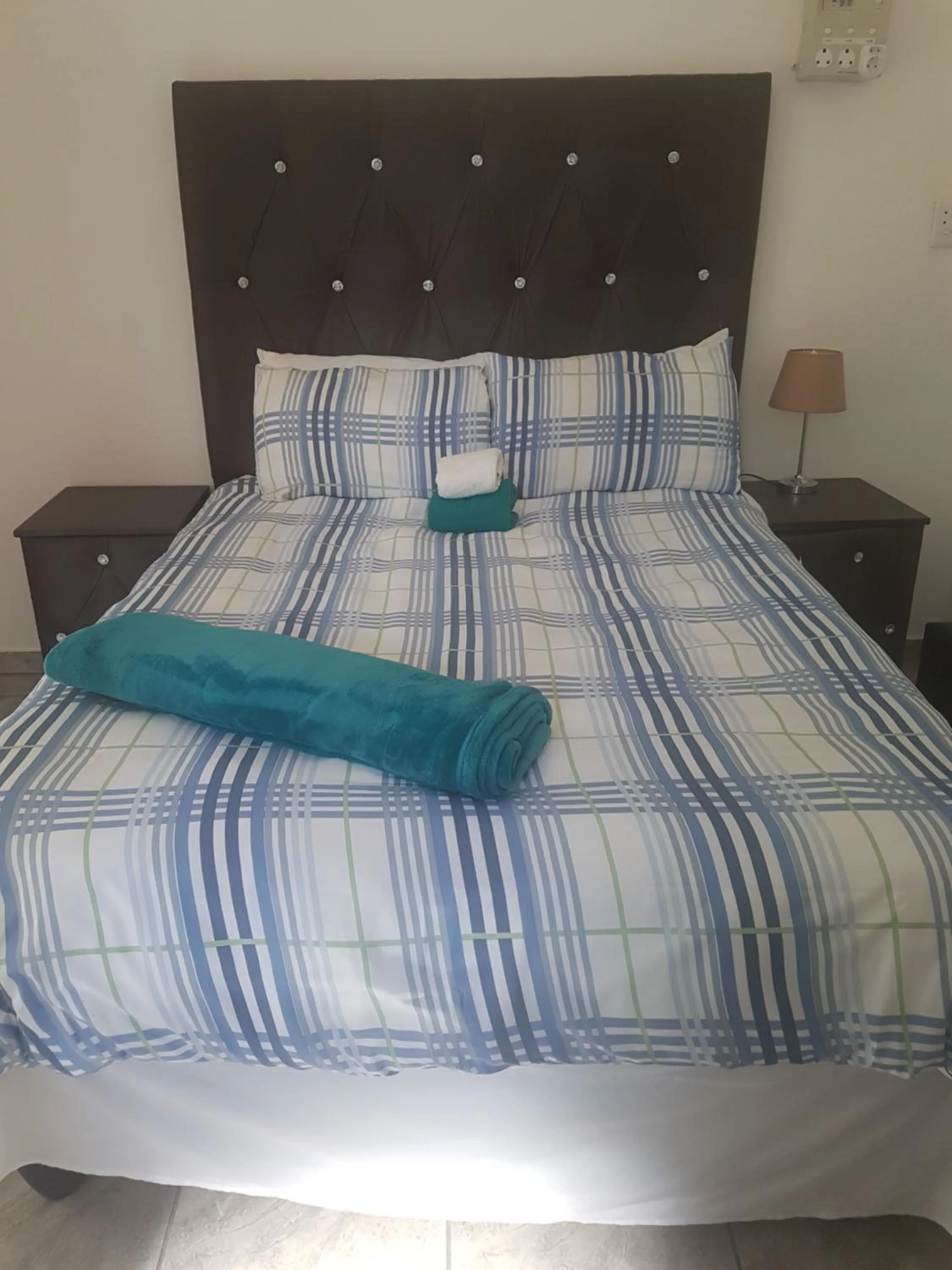 Bed in MZET GUEST HOUSE