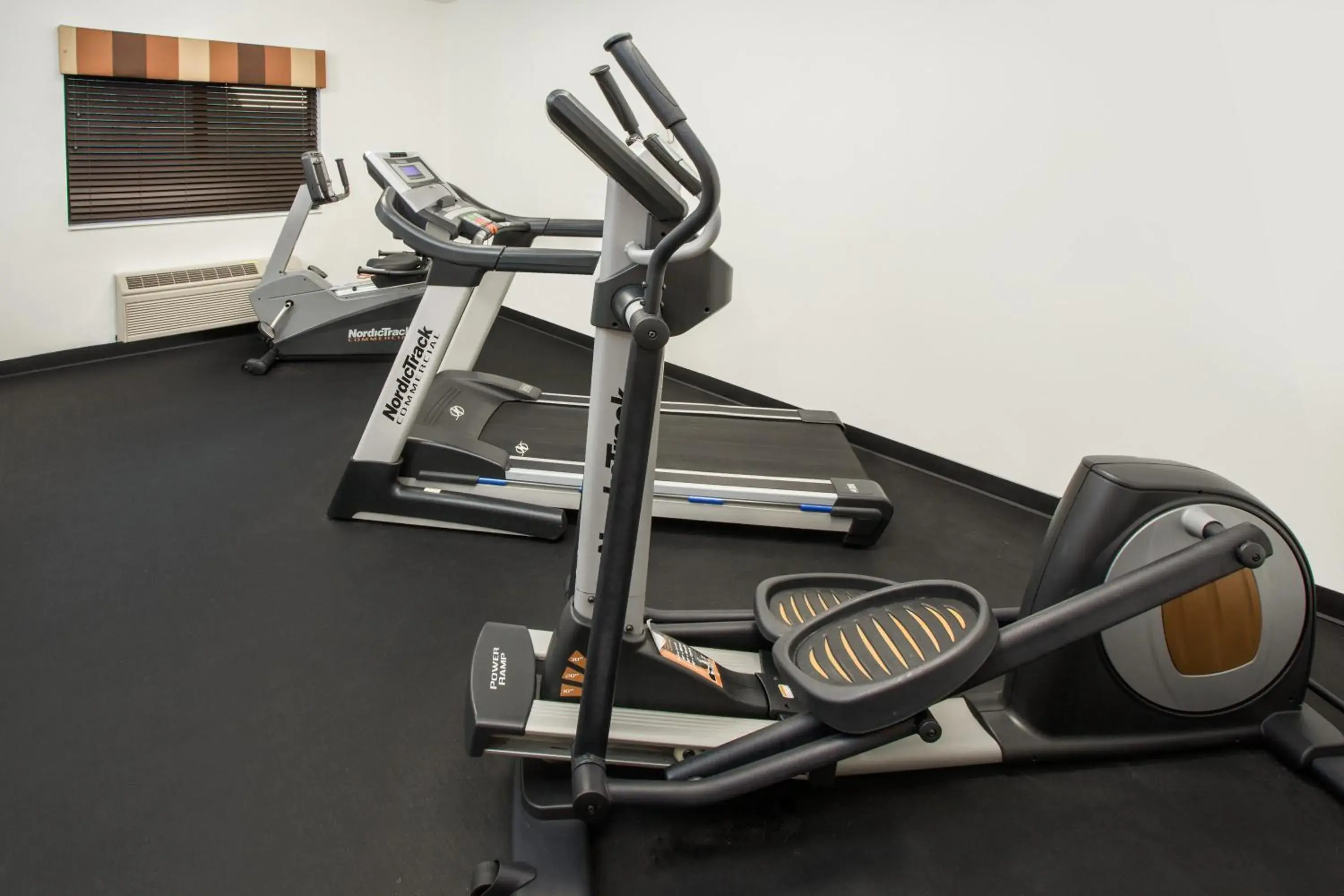 Fitness centre/facilities in Super 8 by Wyndham Three Rivers Fitness centre/facilities in Super 8 by Wyndham Three Rivers